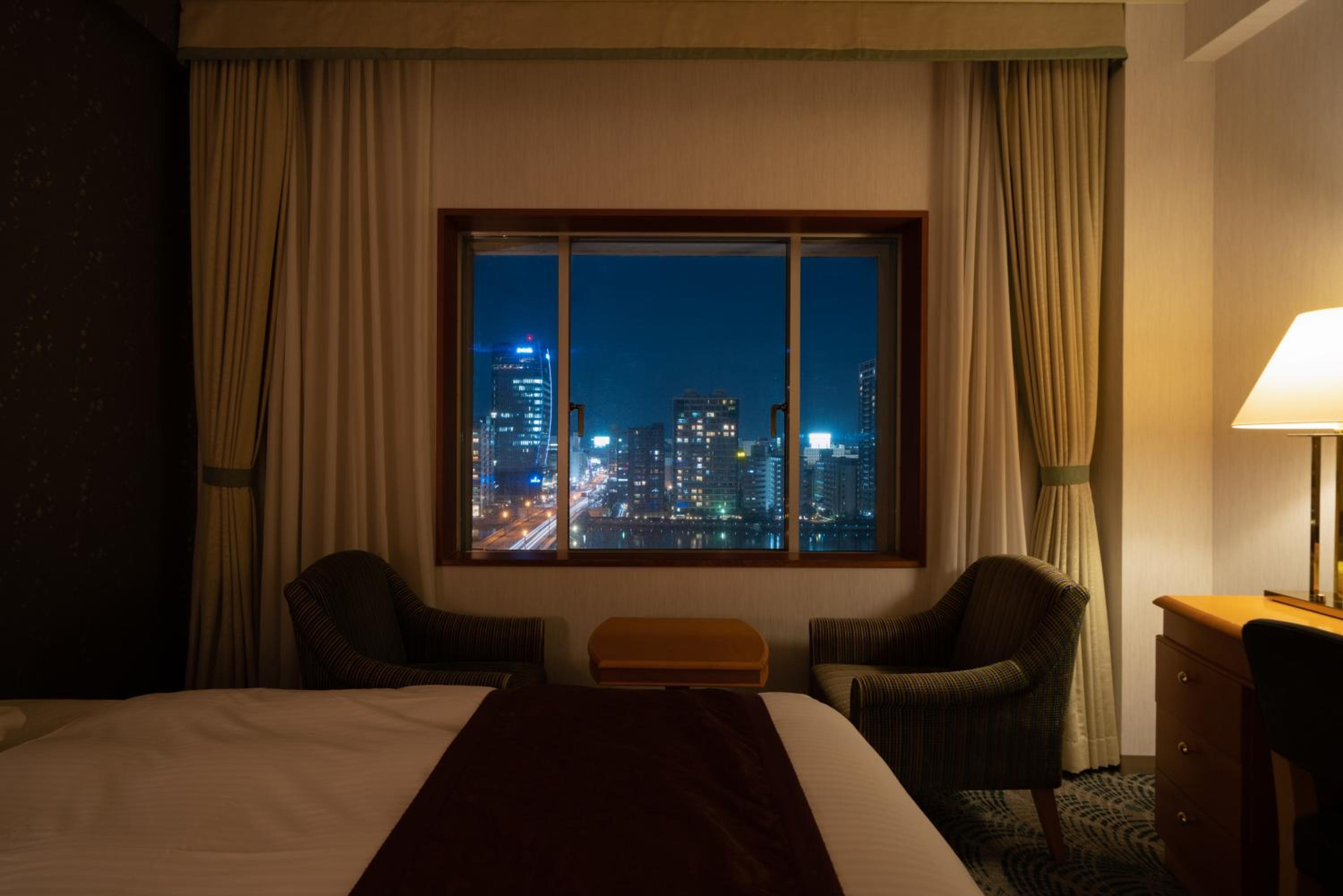 Deluxe Twin Room with Extrabed and River View - Non-Smoking photo 2