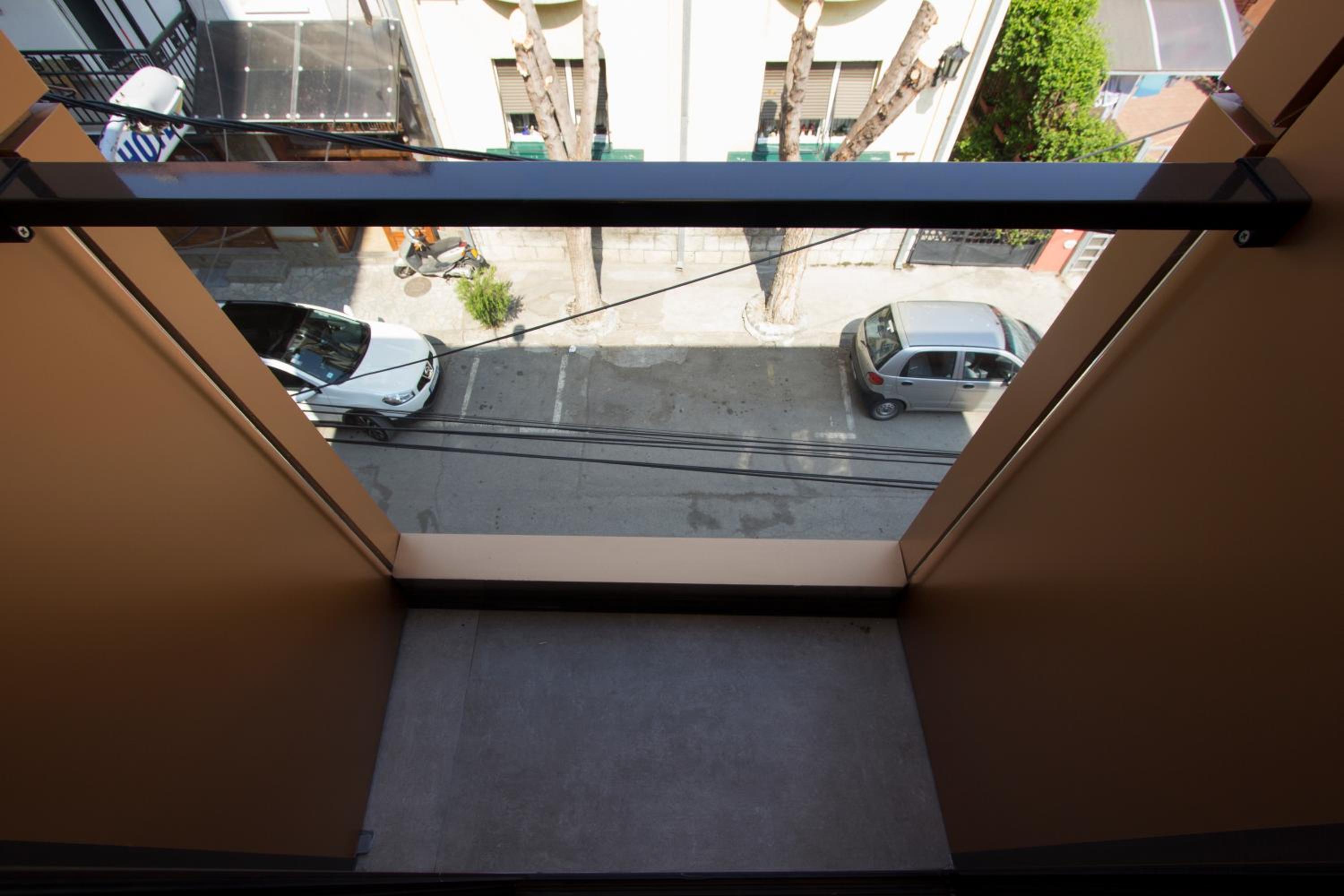 Triple Room with Balcony - Photo 12