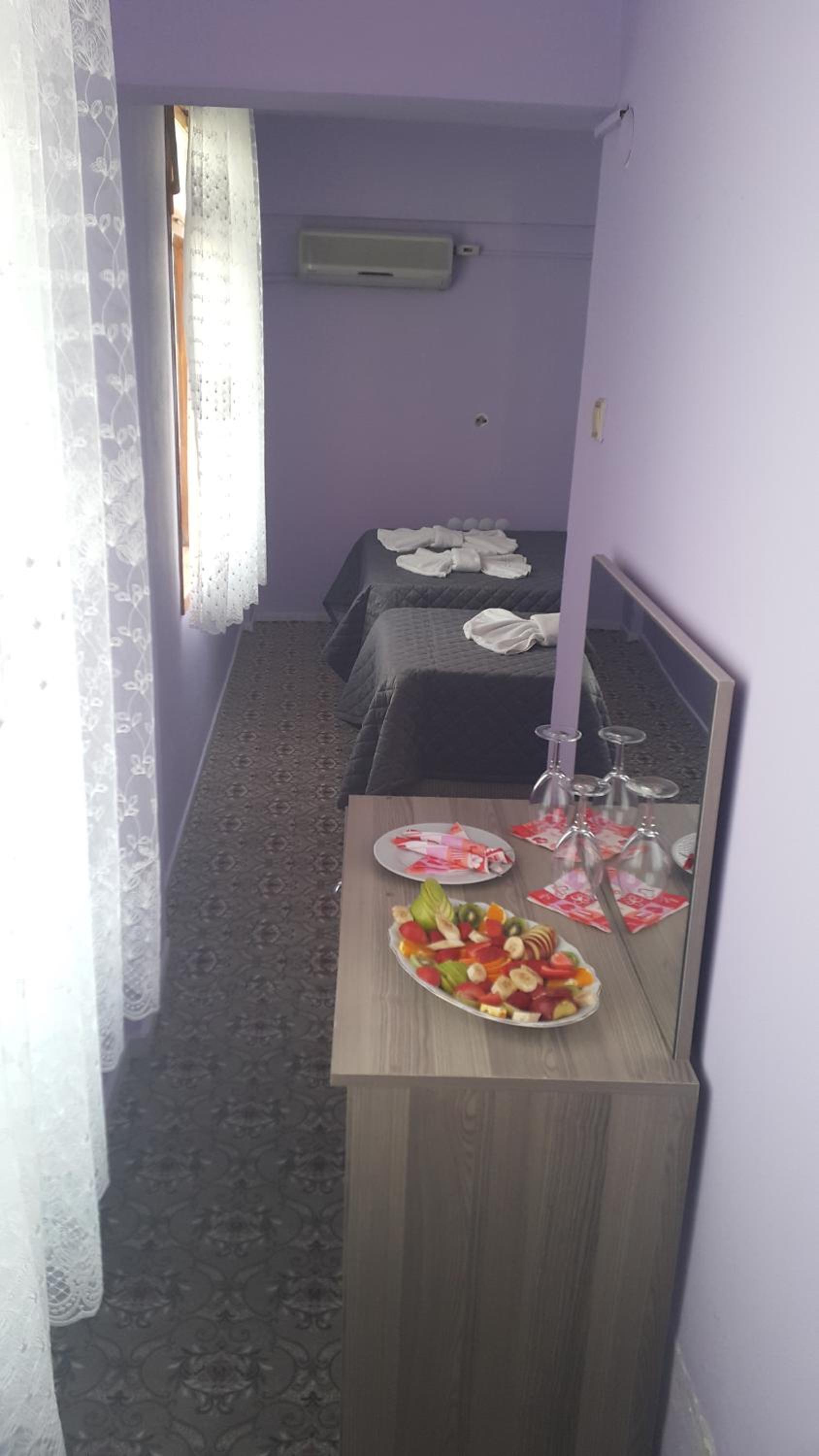 Quadruple Room with Balcony photo 2
