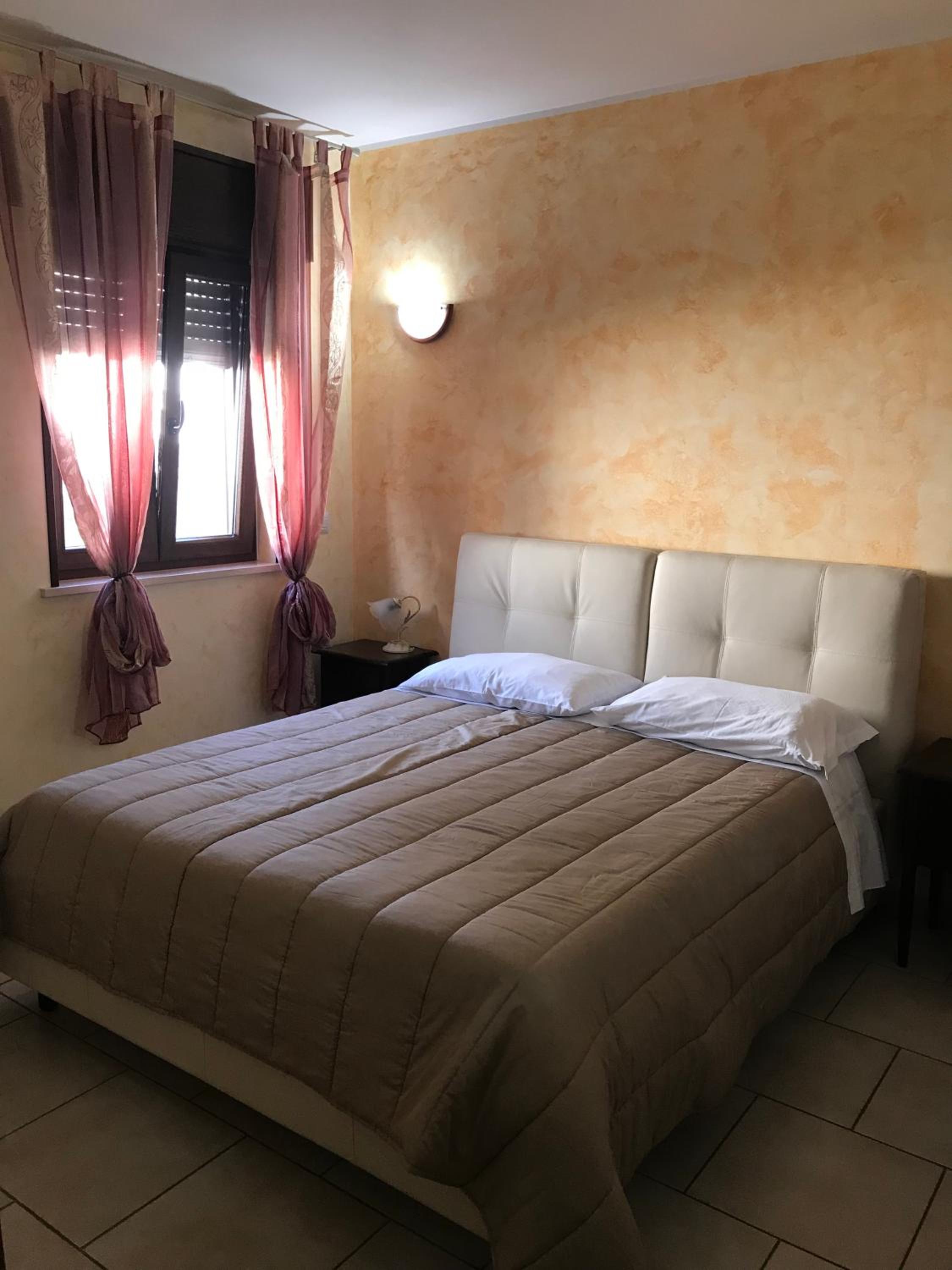 Quadruple Room - Photo 1