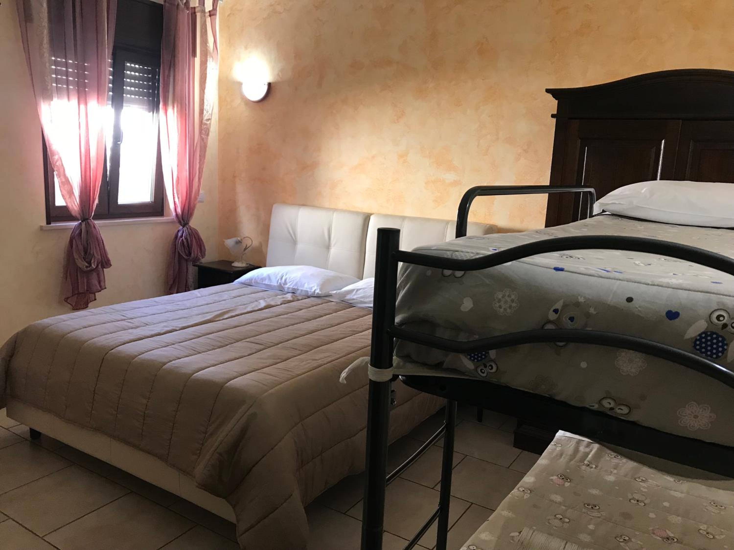 Quadruple Room - Photo 7
