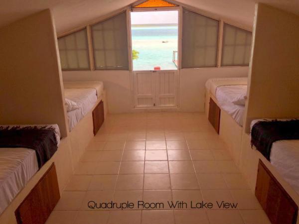 Quadruple Single Bed Room With Lake View