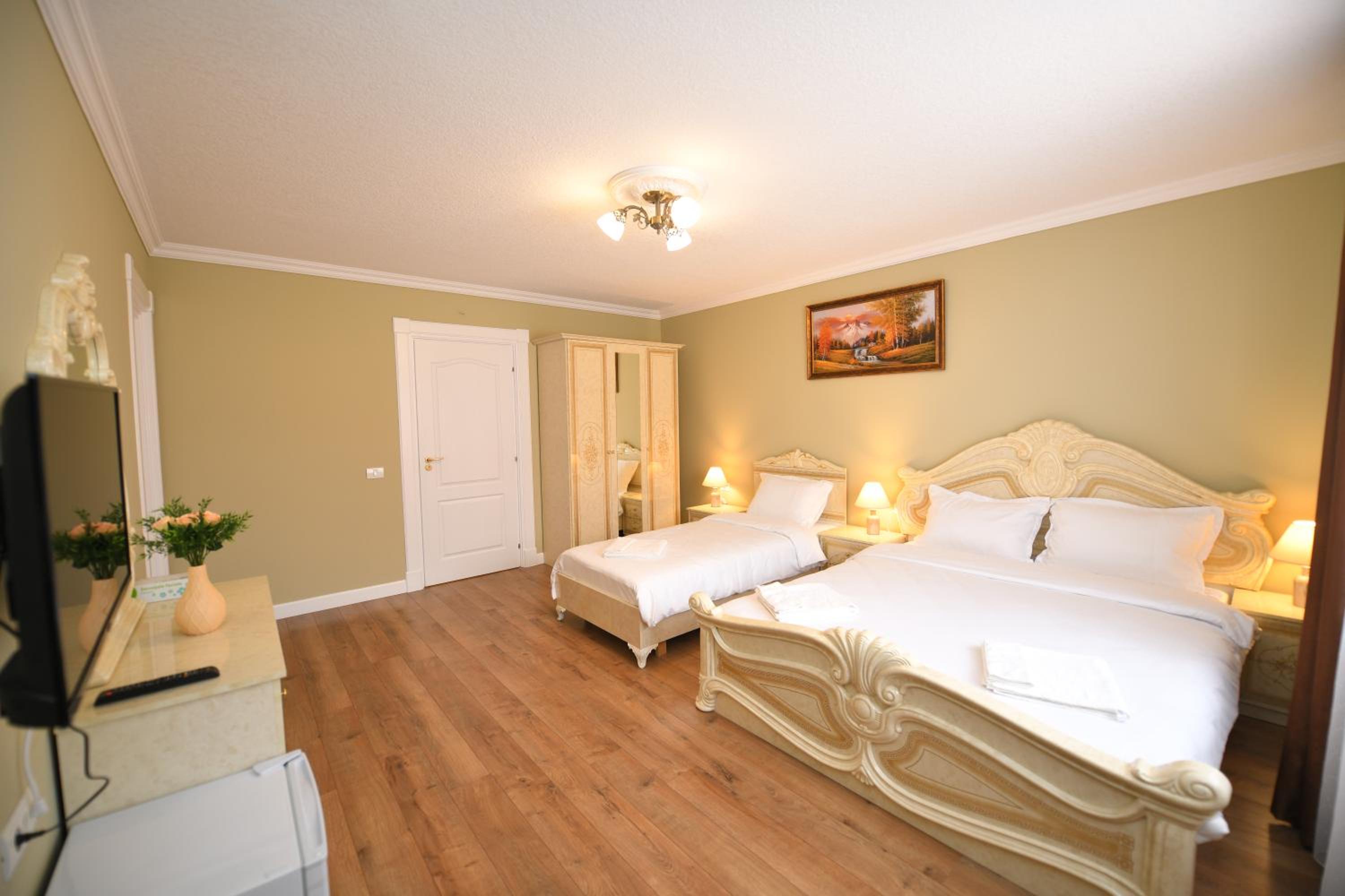 Deluxe Triple Room - Photo 1