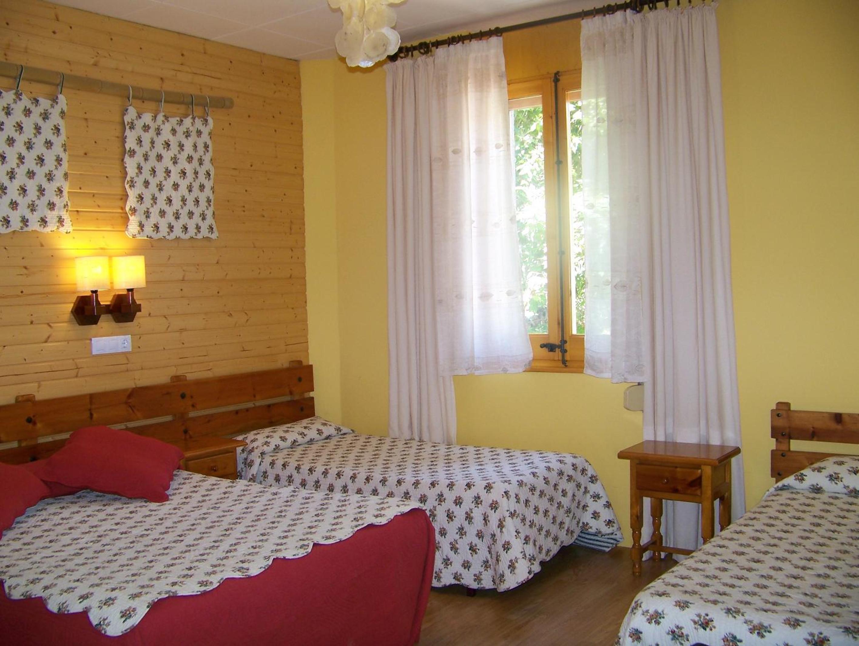 Habitación Cuádruple (2 Adultos + 2 Niños)