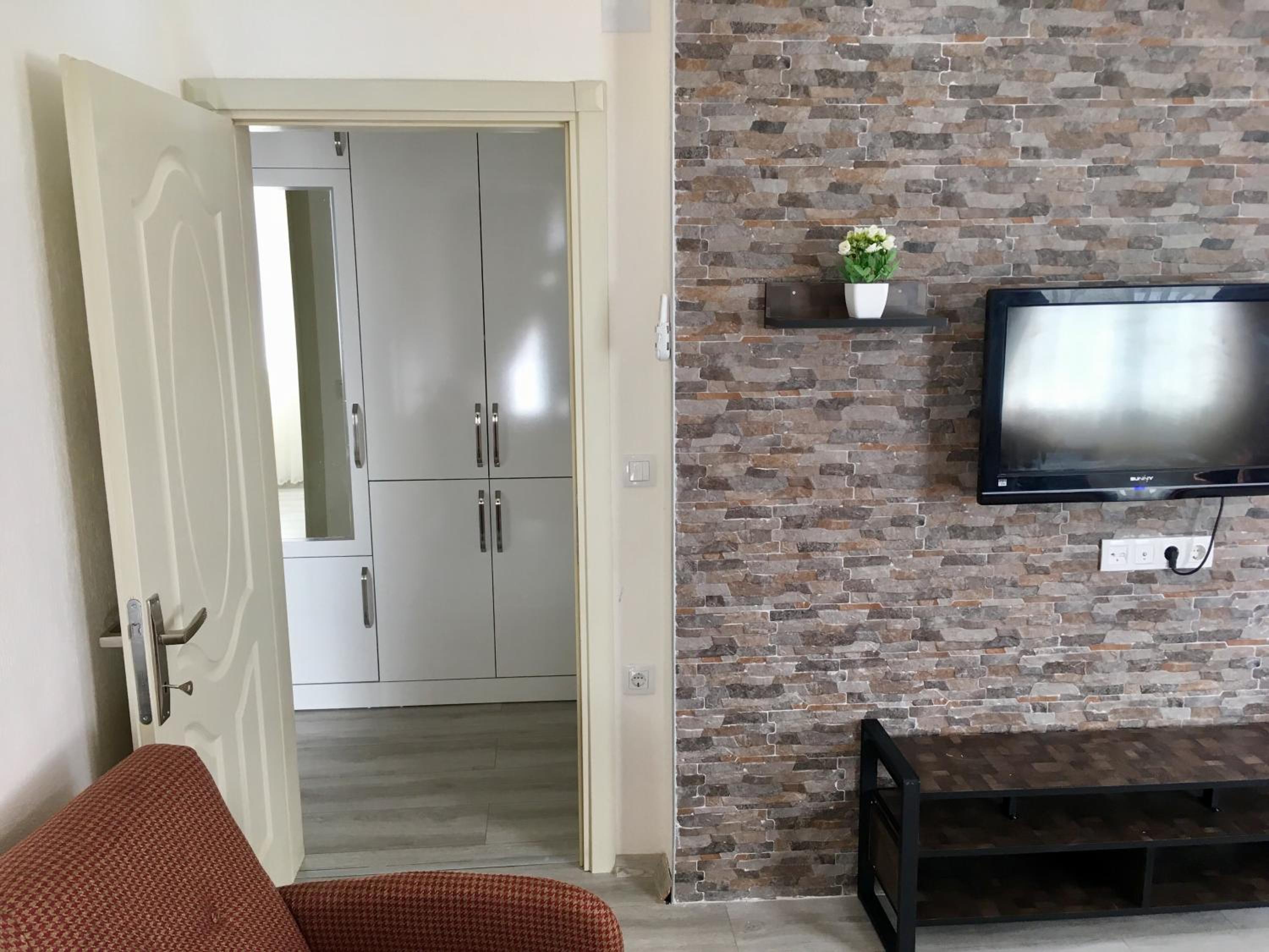 Apartment with Balcony - Photo 7