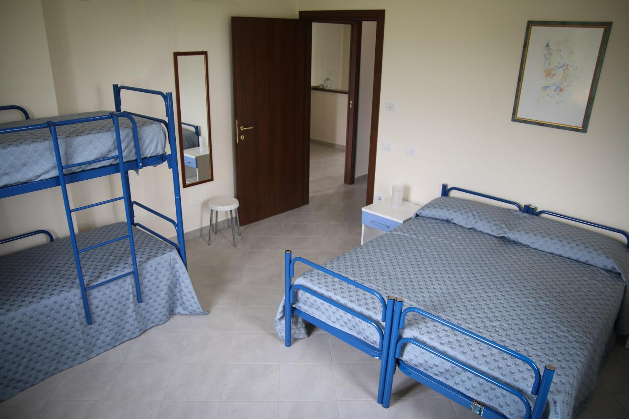 Quadruple Room with Private Bathroom photo 3