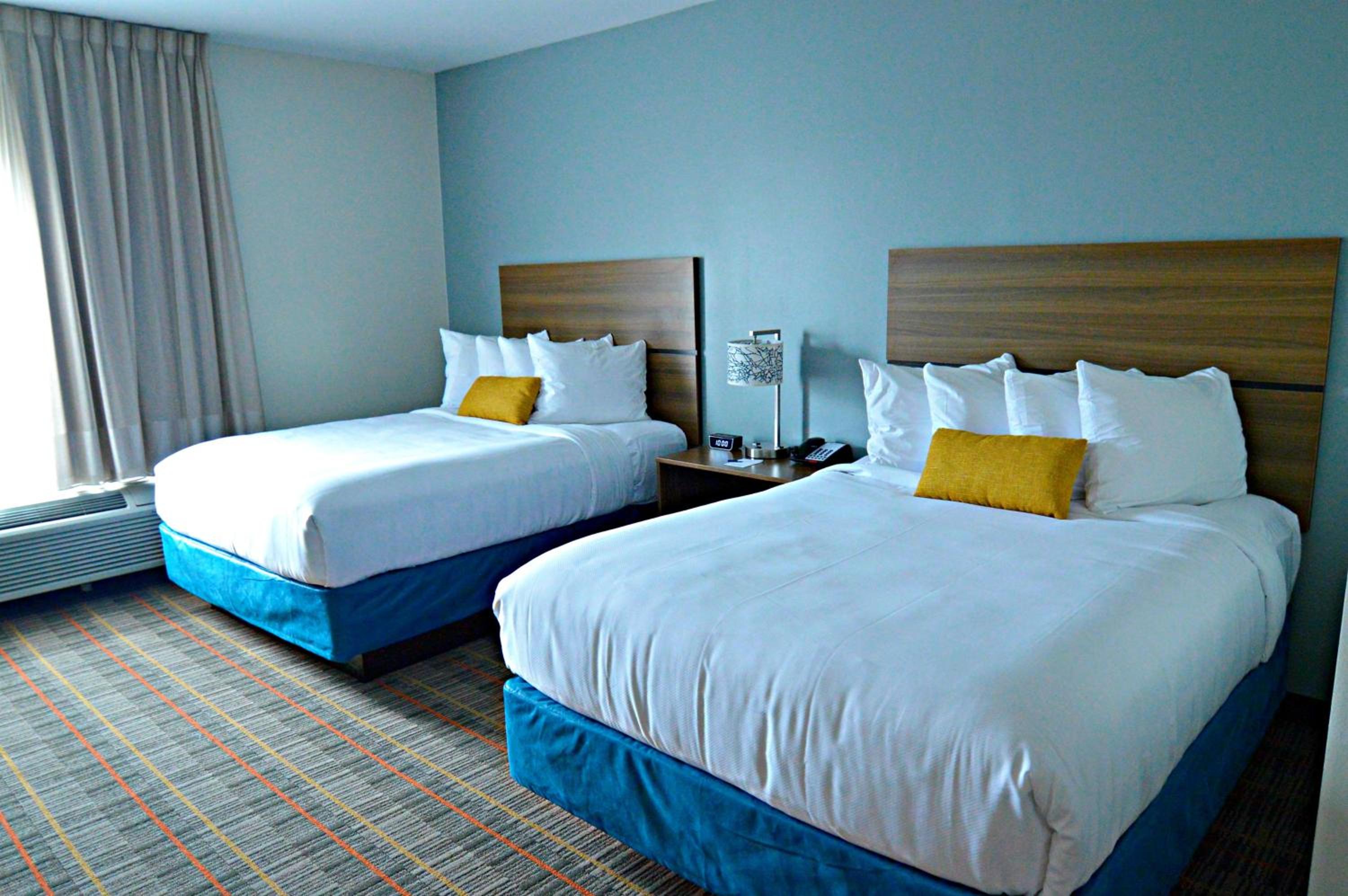 Queen Room with Two Queen Beds and Kitchenette - Non-Smoking - Photo 1