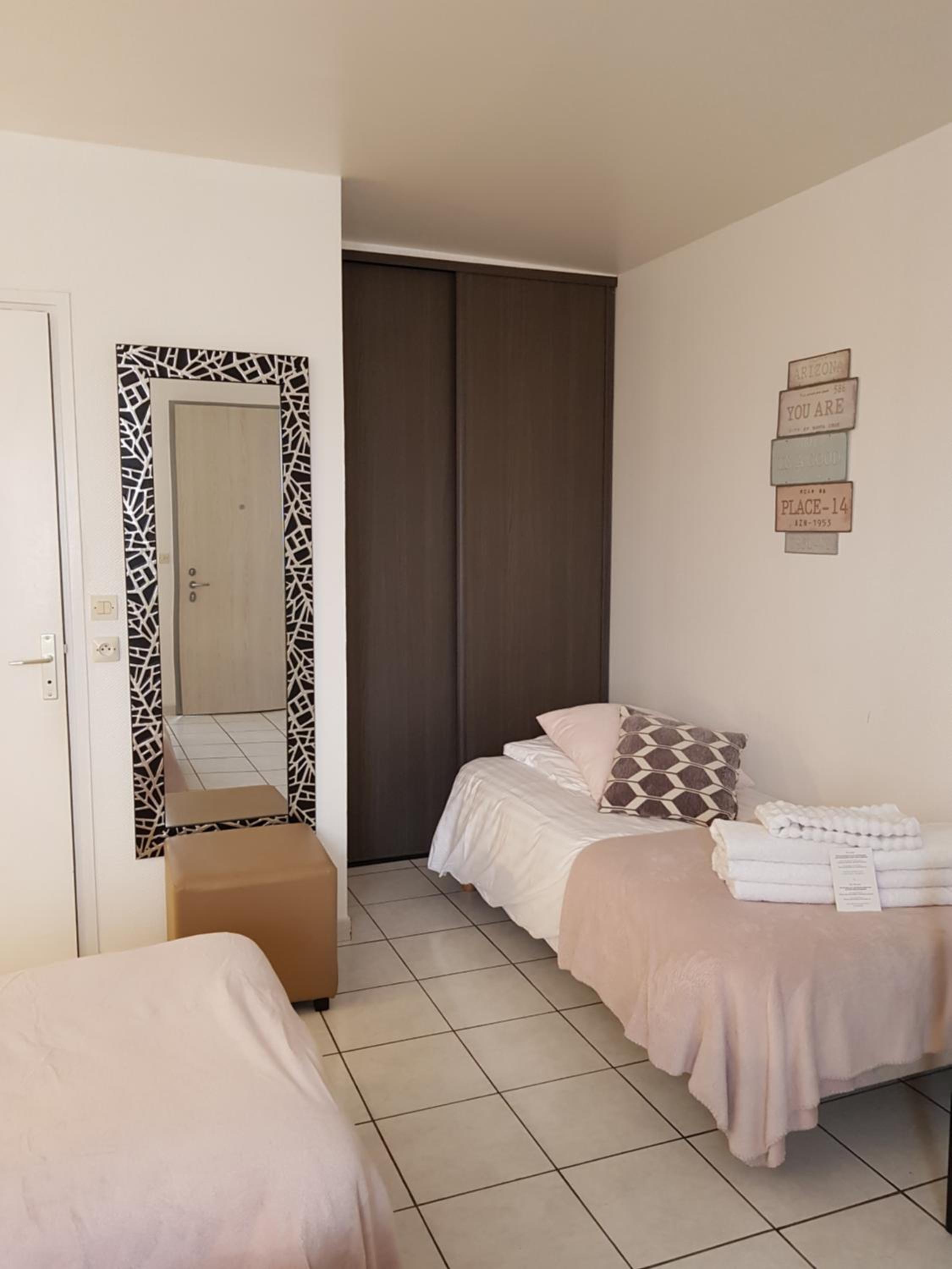 Triple Room (1 Double Bed + 1 Single Bed)