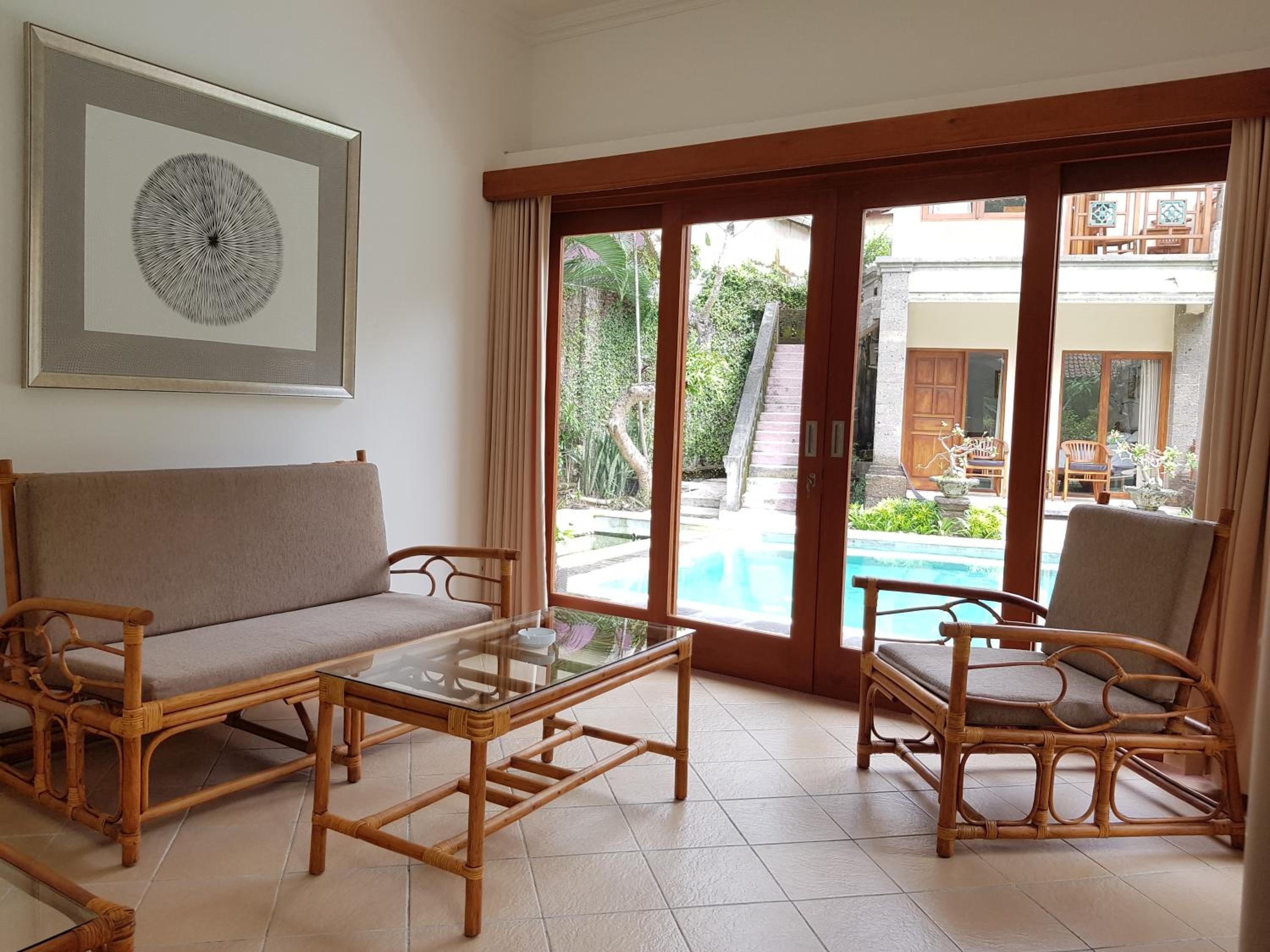 Deluxe Room (2 Adults + 1 Child) - Photo 1