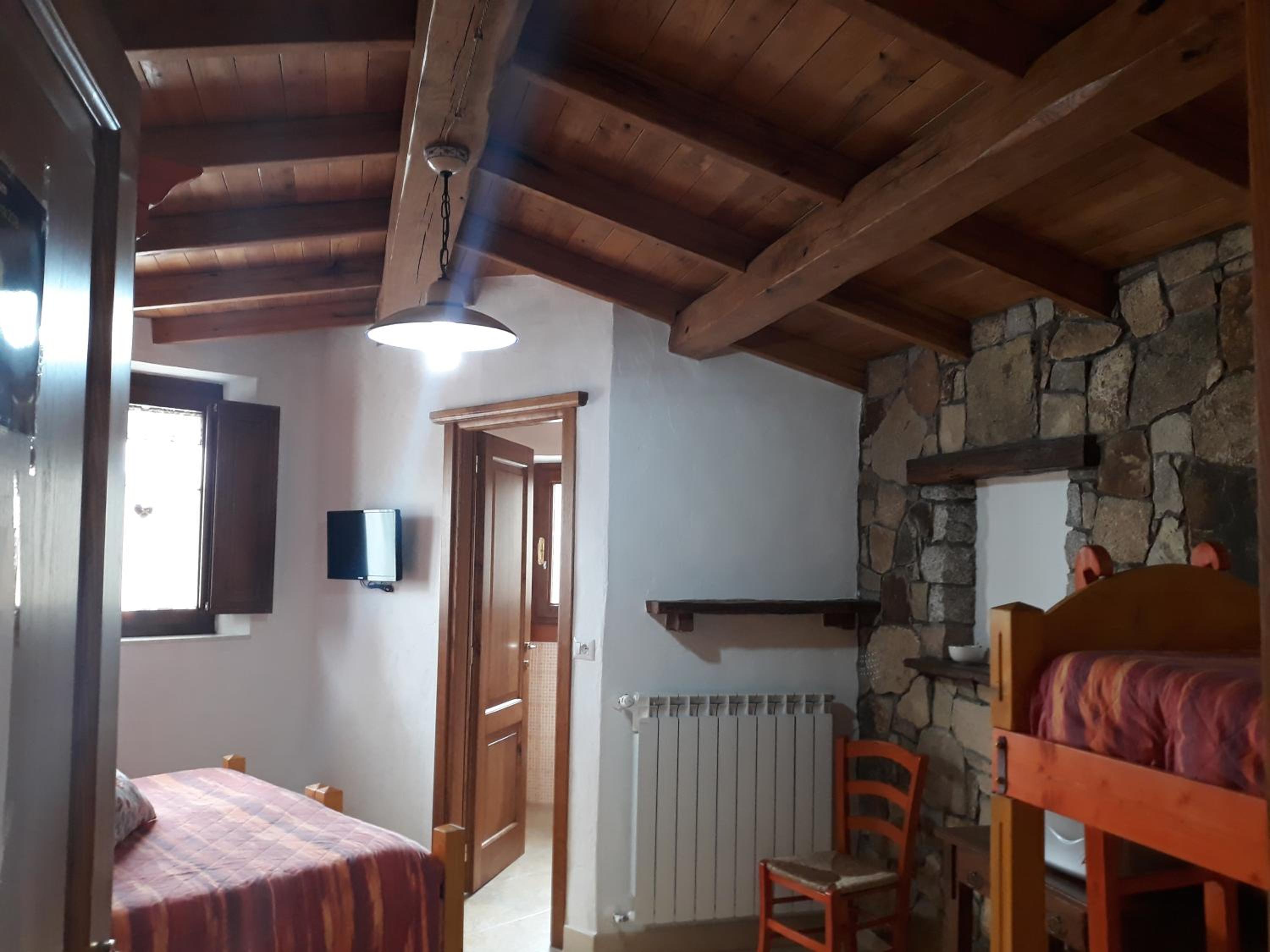 Quadruple Room with Private Bathroom photo 1