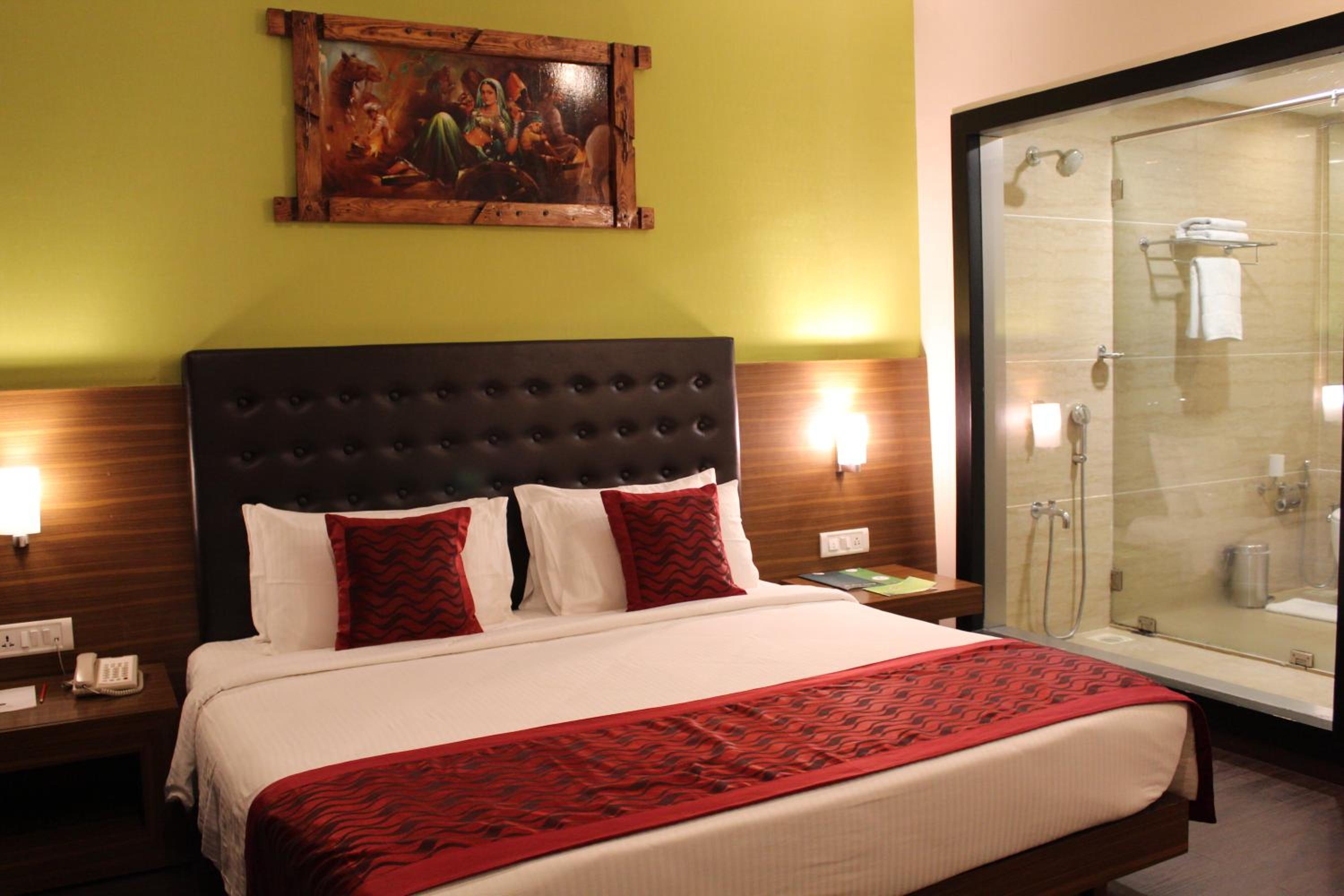 Super Deluxe Room King Bed - Photo 16