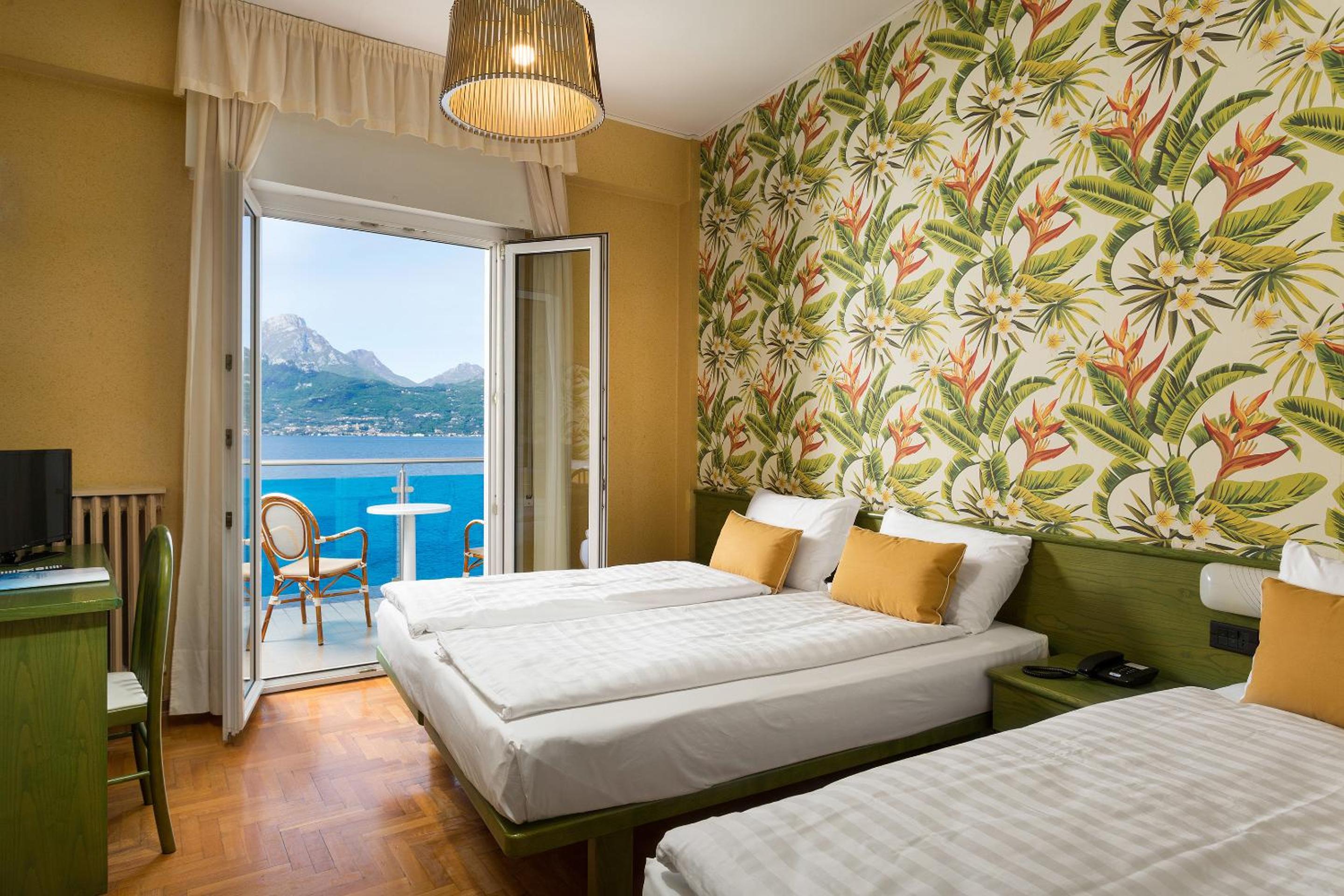 Quadruple Room with Balcony - Photo 1