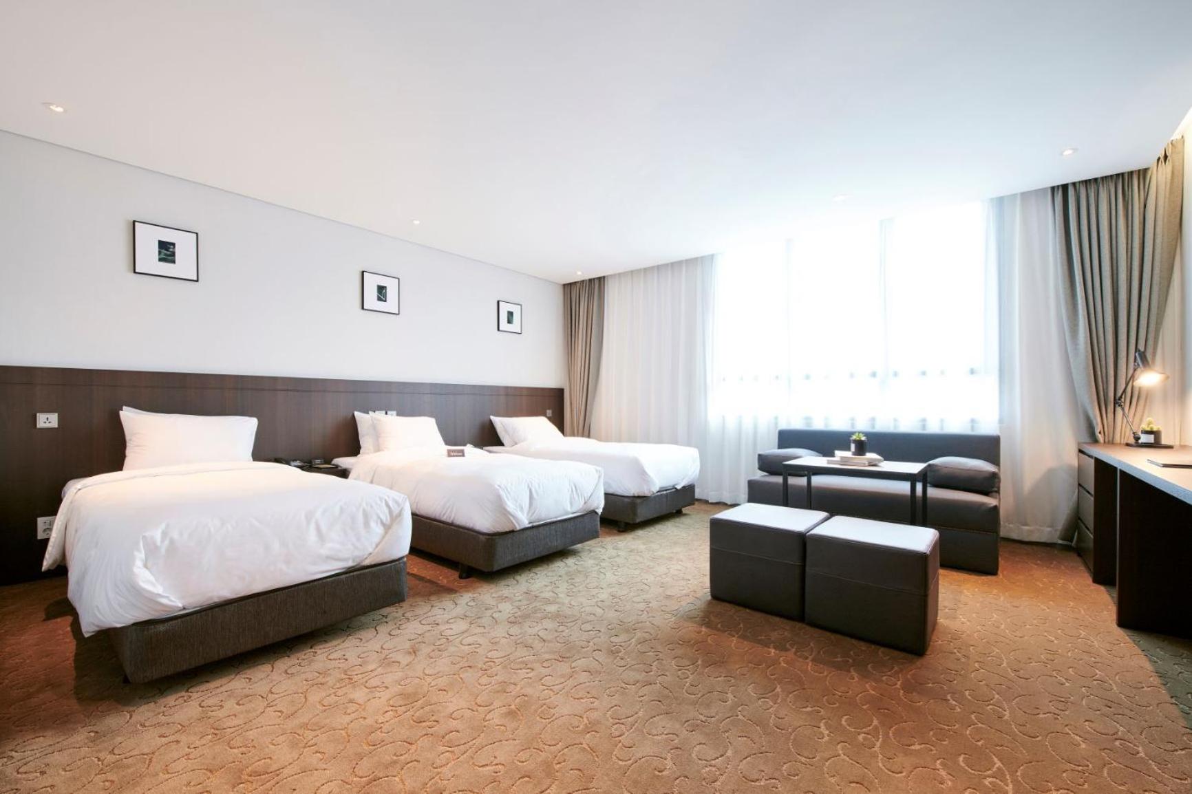 Premium Triple Room - Photo 1