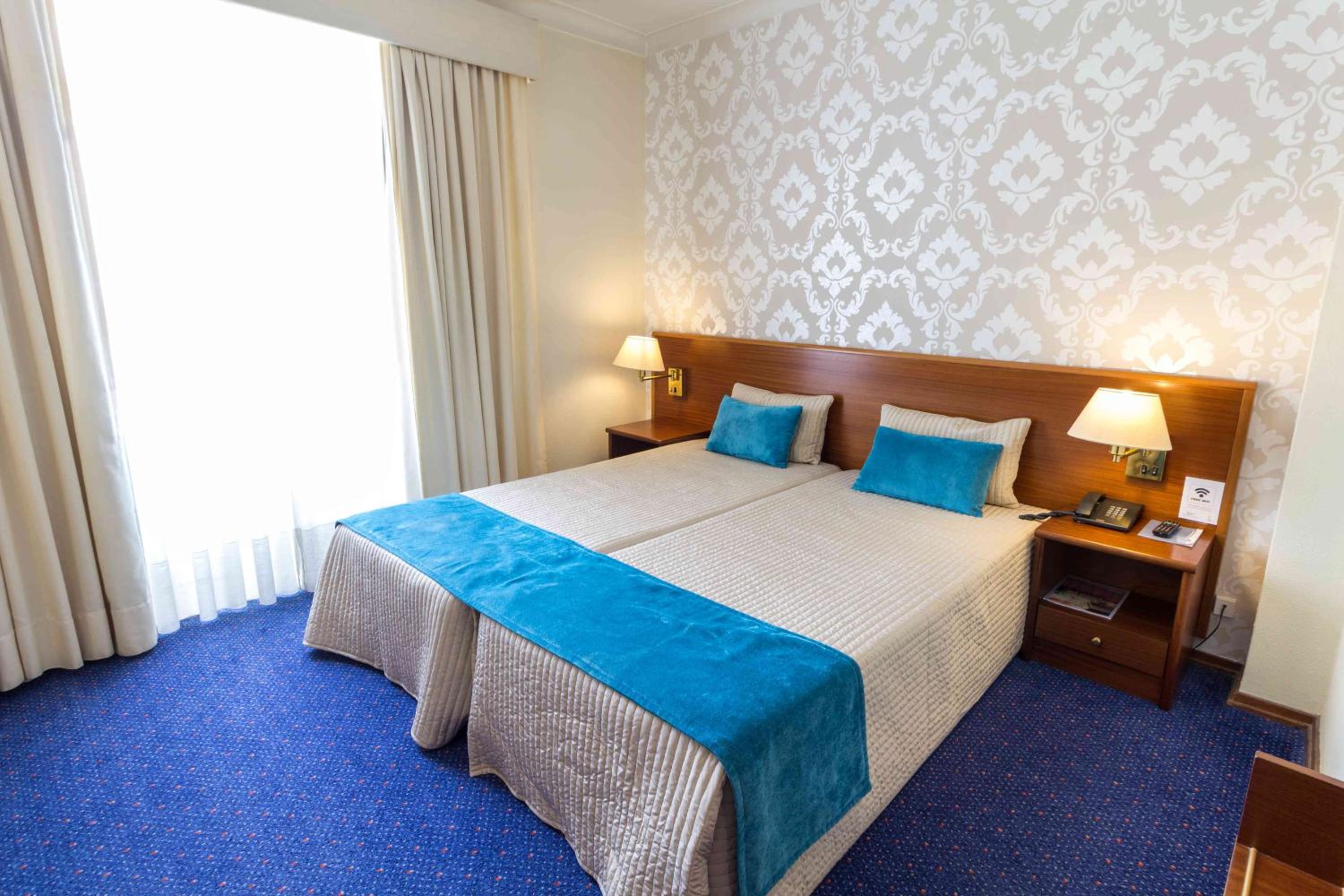 Twin Room - Photo 1