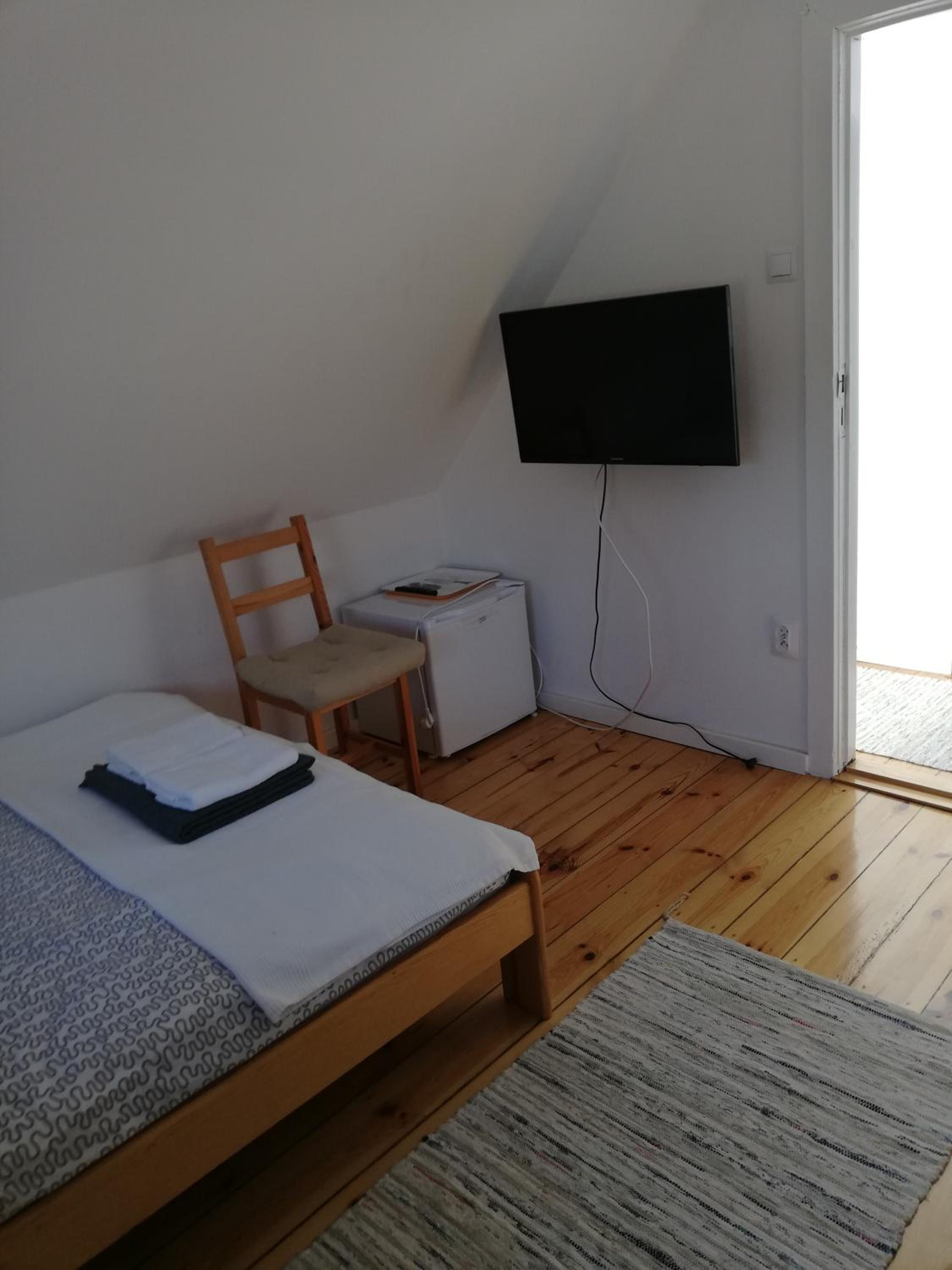 Basic Triple Room with Shared Bathroom photo 1