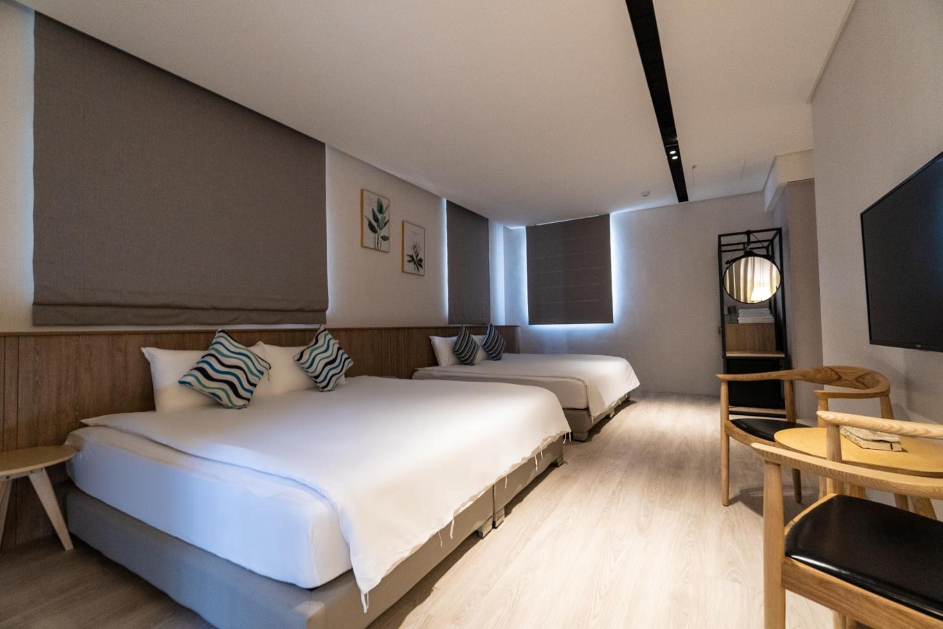 Deluxe Quadruple Room - Photo 8