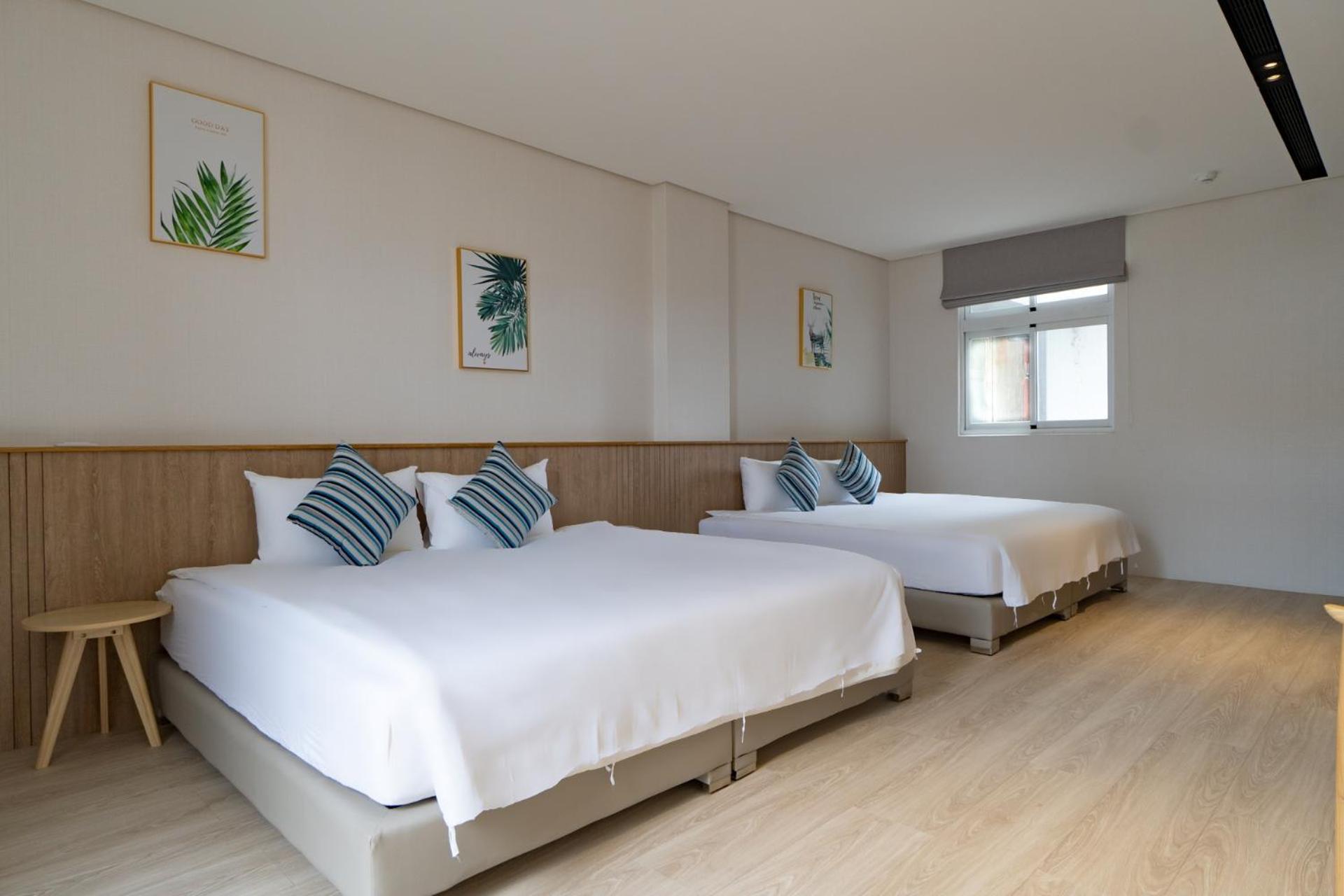 Deluxe Quadruple Room - Photo 2
