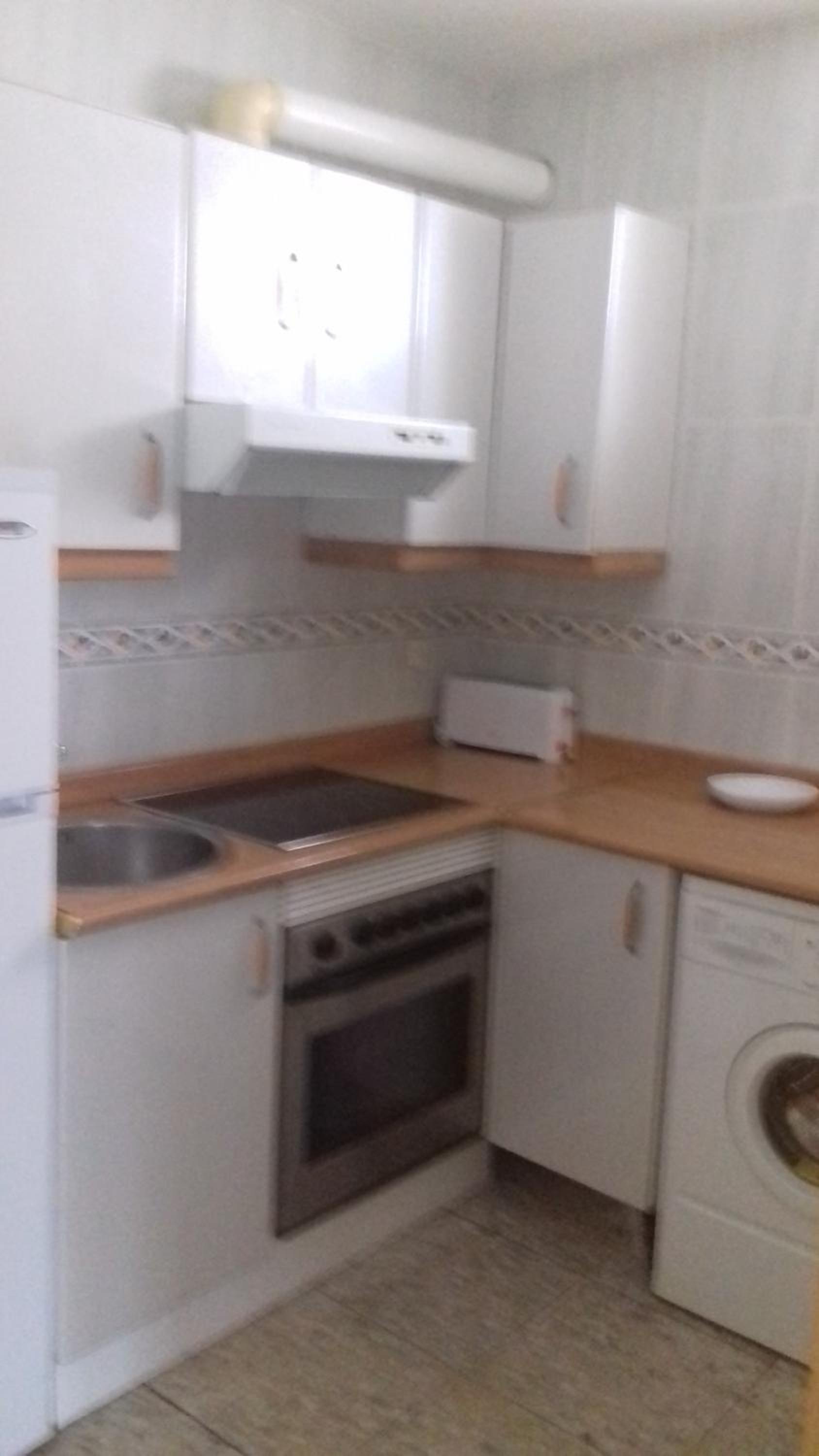 Three-Bedroom House - Photo 4