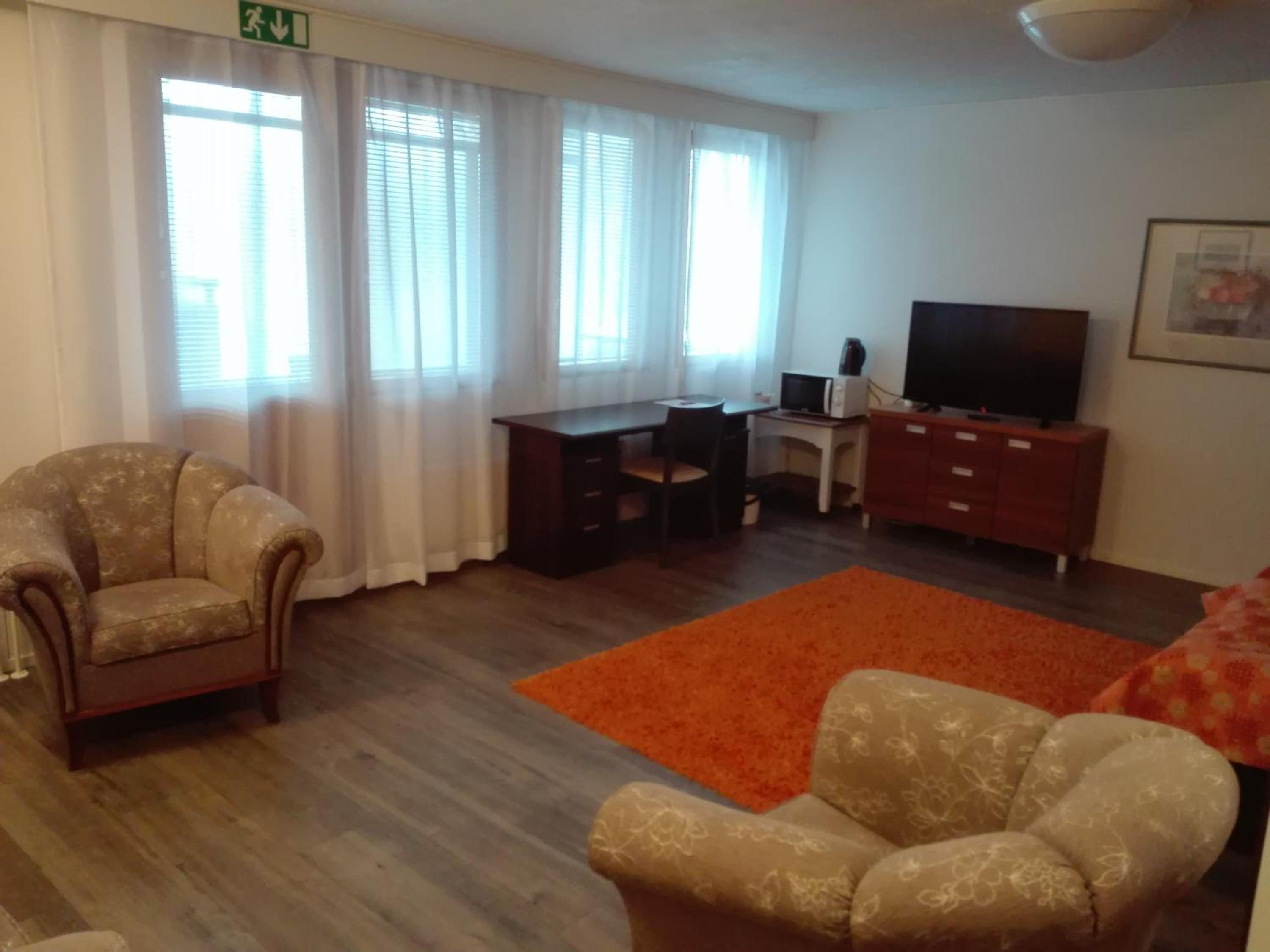 Family Room with Balcony - Photo 1