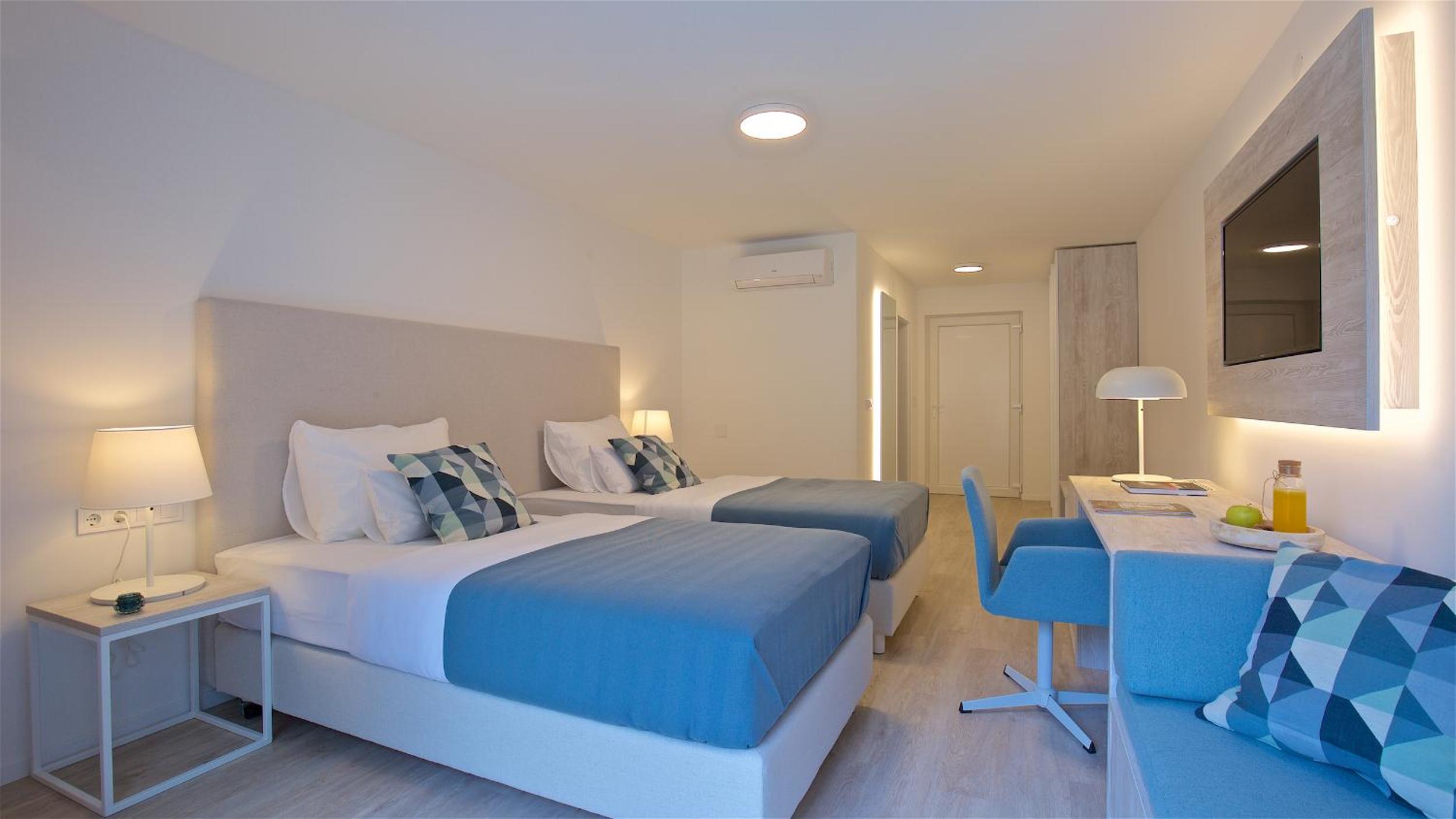 Deluxe Queen Room with Two Queen Beds - Photo 1