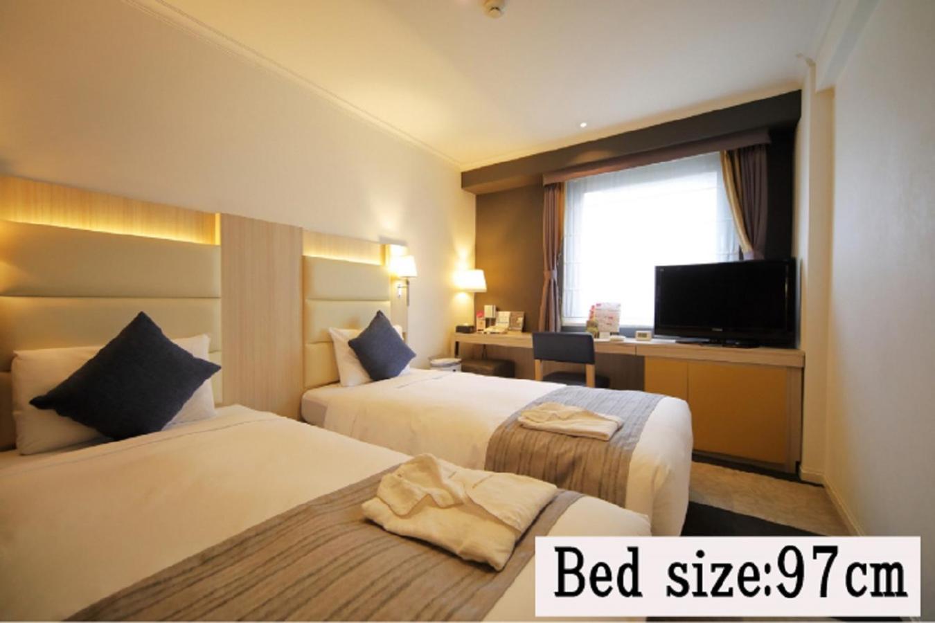 Economy Twin Room - Non-Smoking photo 2