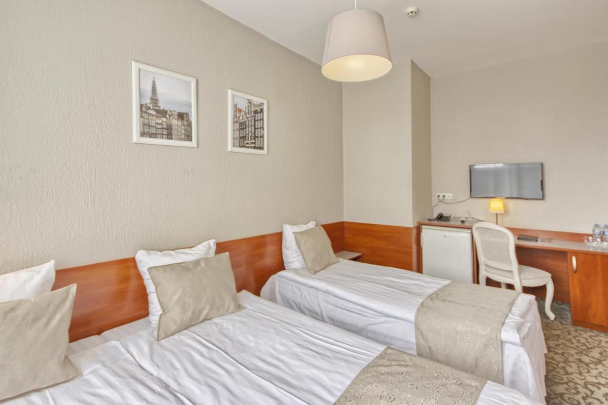 Triple Room - Photo 1