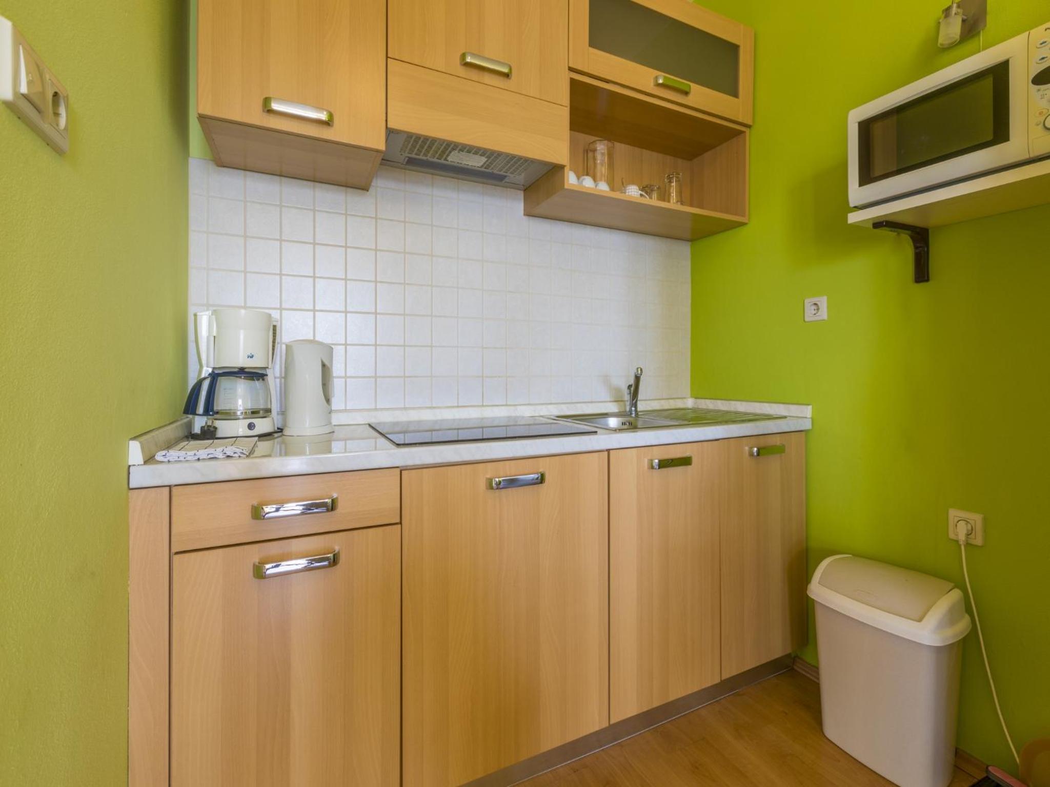 Apartment with Balcony - Photo 16
