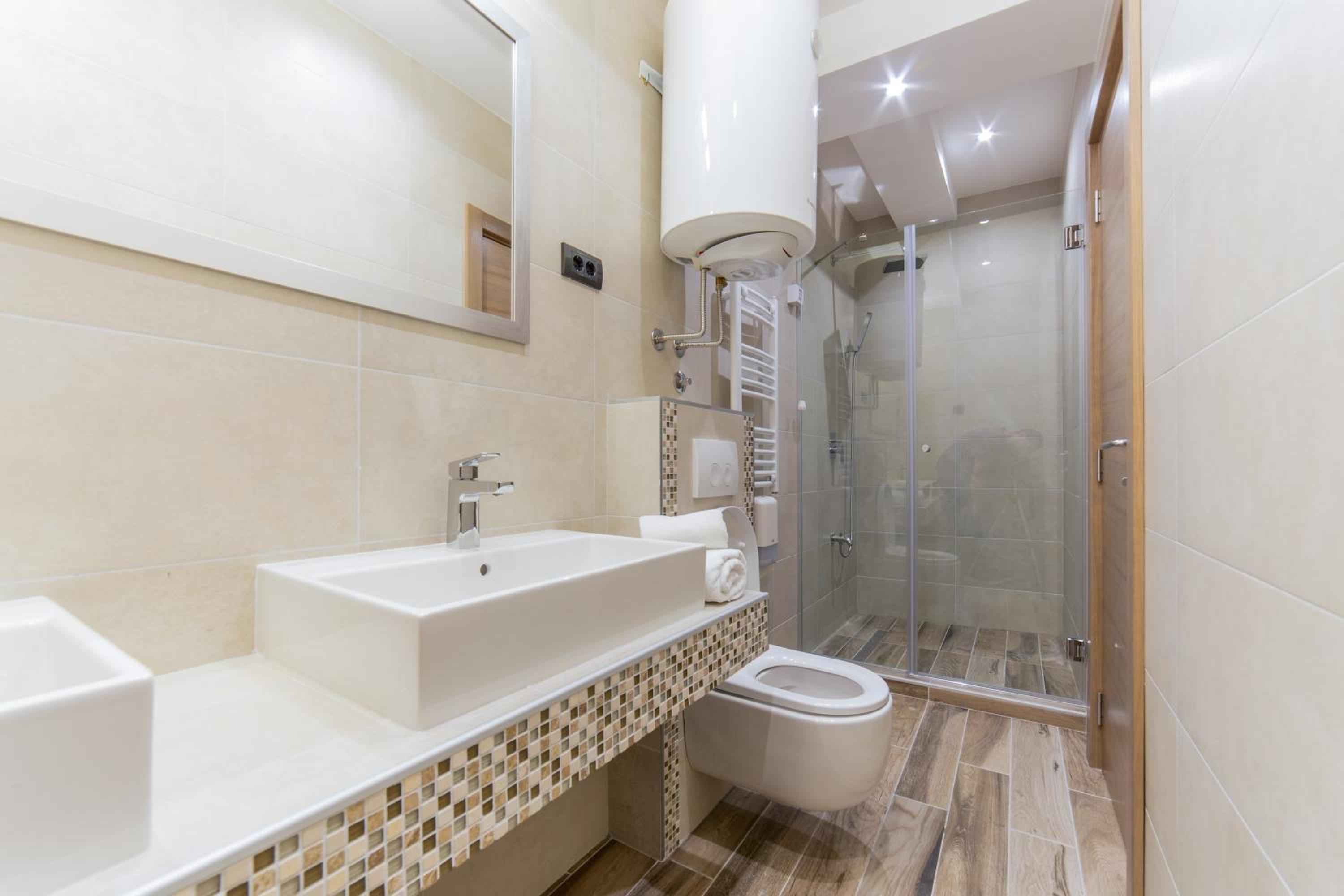 Deluxe Quadruple Room - Photo 6
