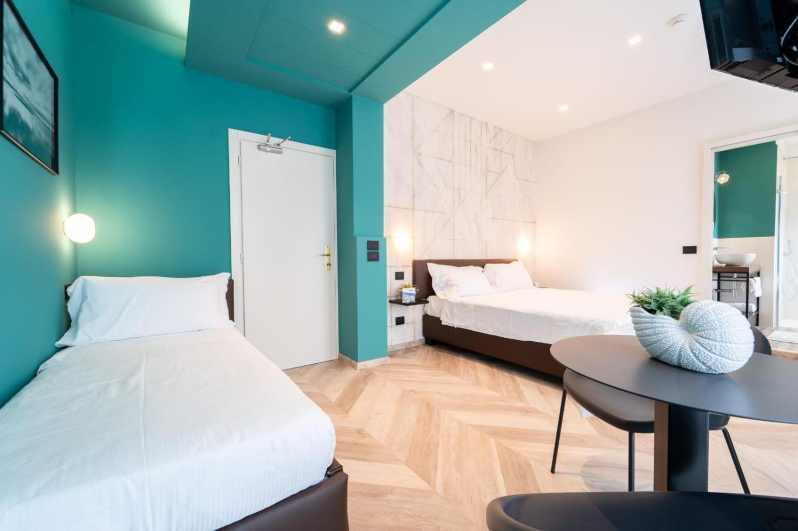 Deluxe Quadruple Room - Photo 4