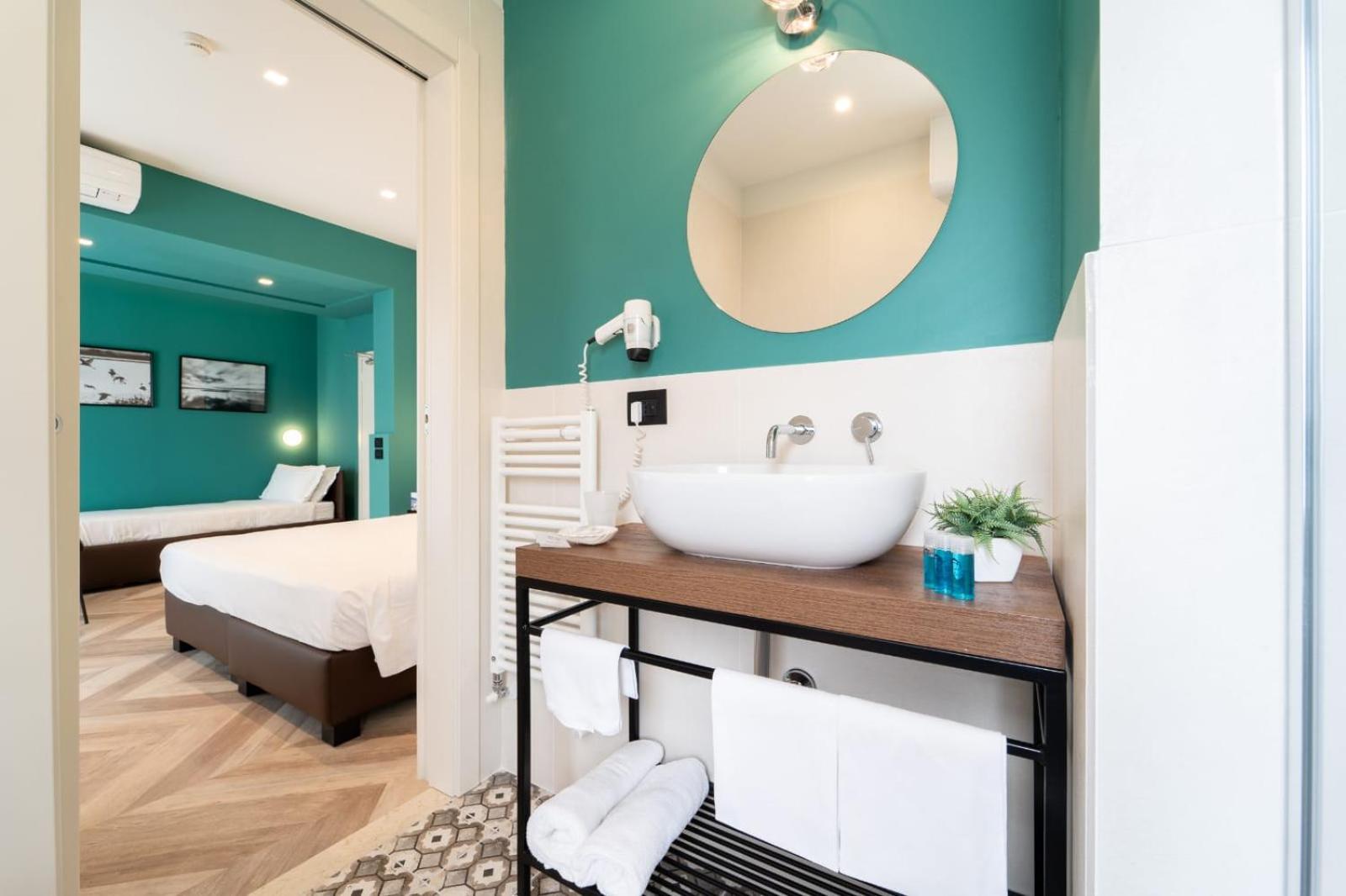Deluxe Quadruple Room - Photo 7
