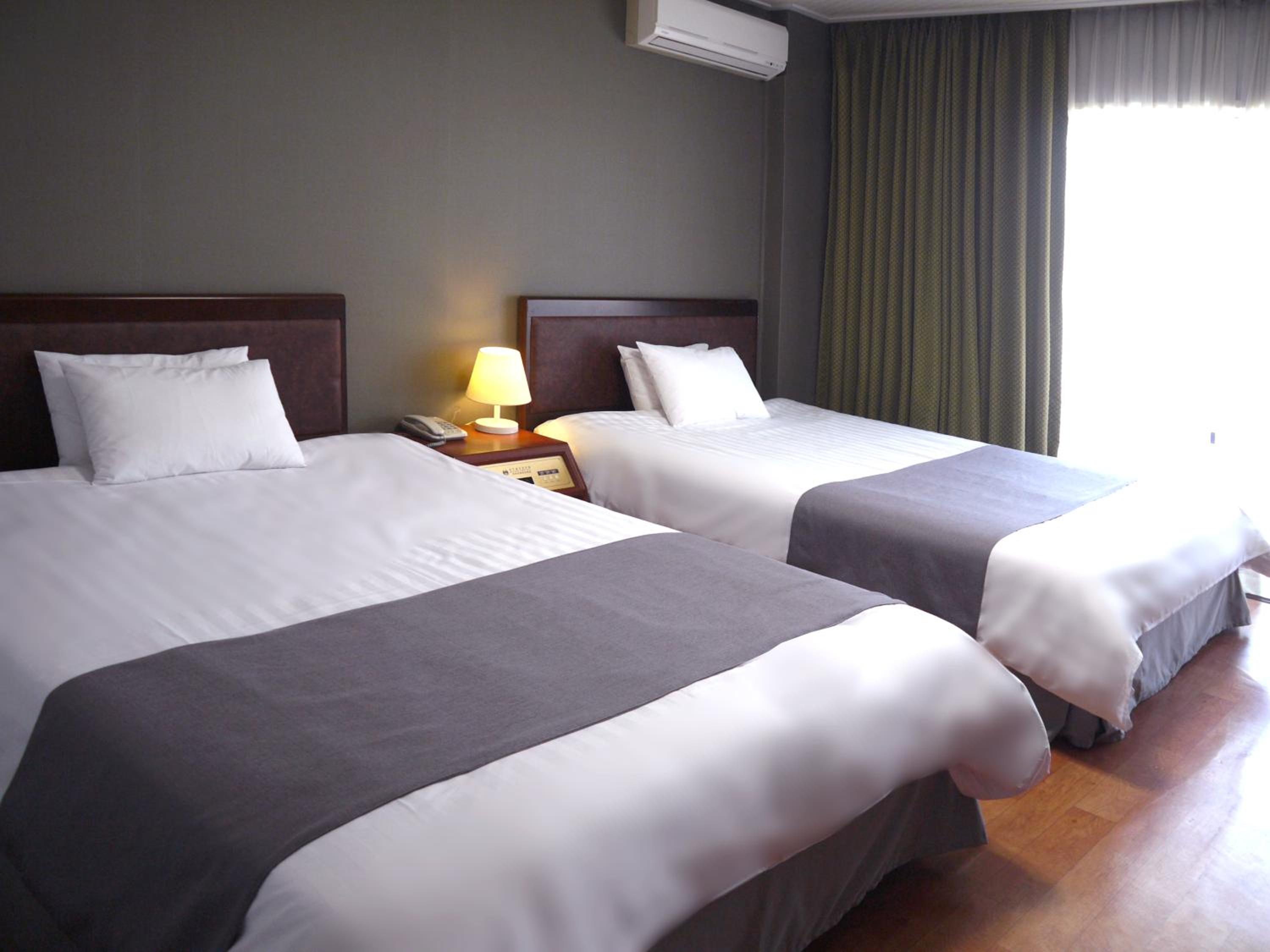 Standard Twin Room - Photo 1