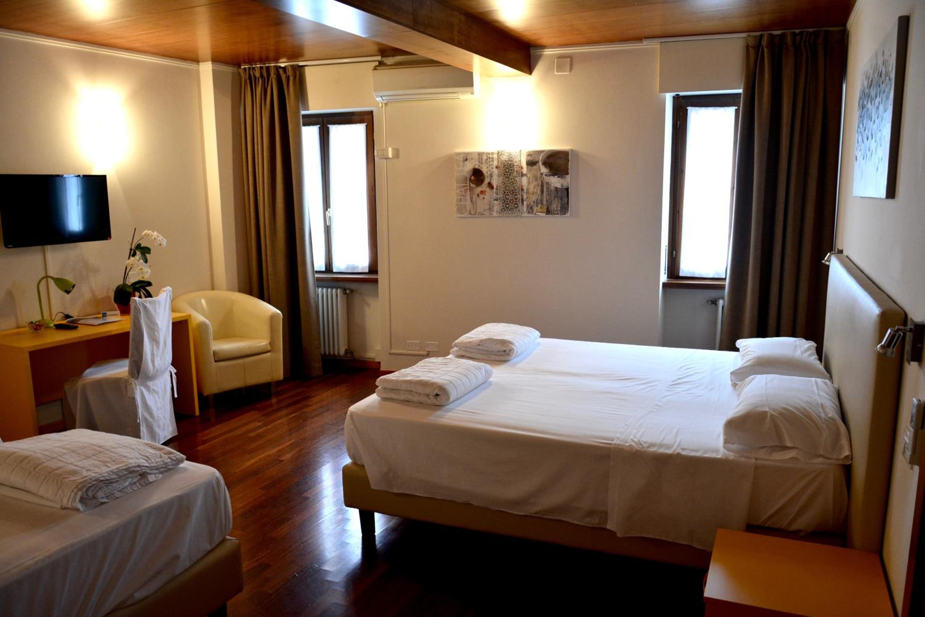 Triple Room - Photo 1