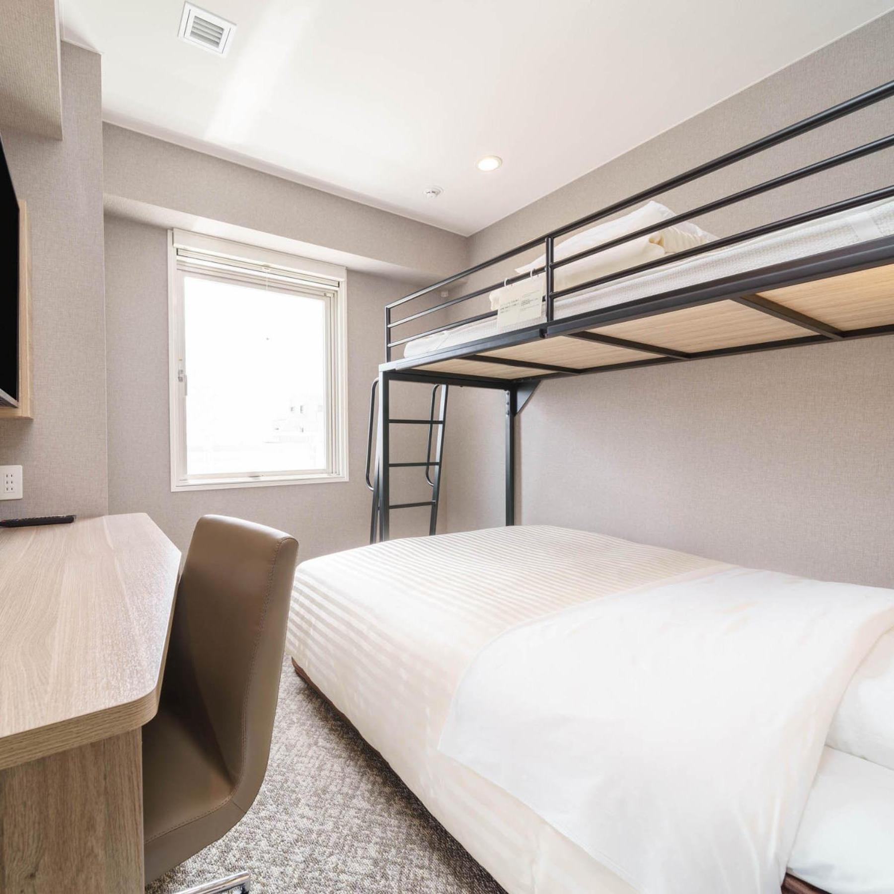 Room with Double Bed and Bunk Bed - Photo 1