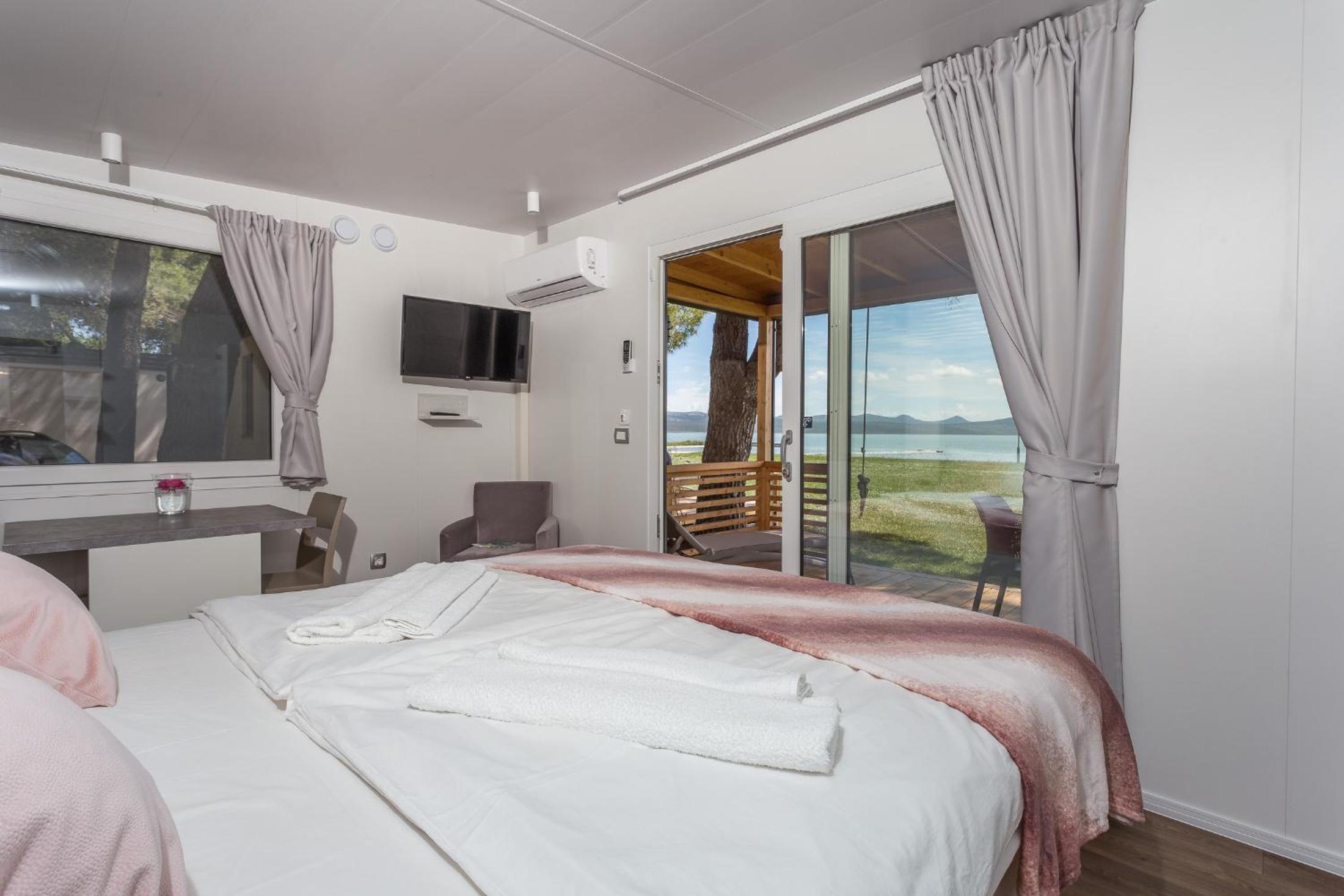 Mobile home with Terrace and Lake View - Photo 1