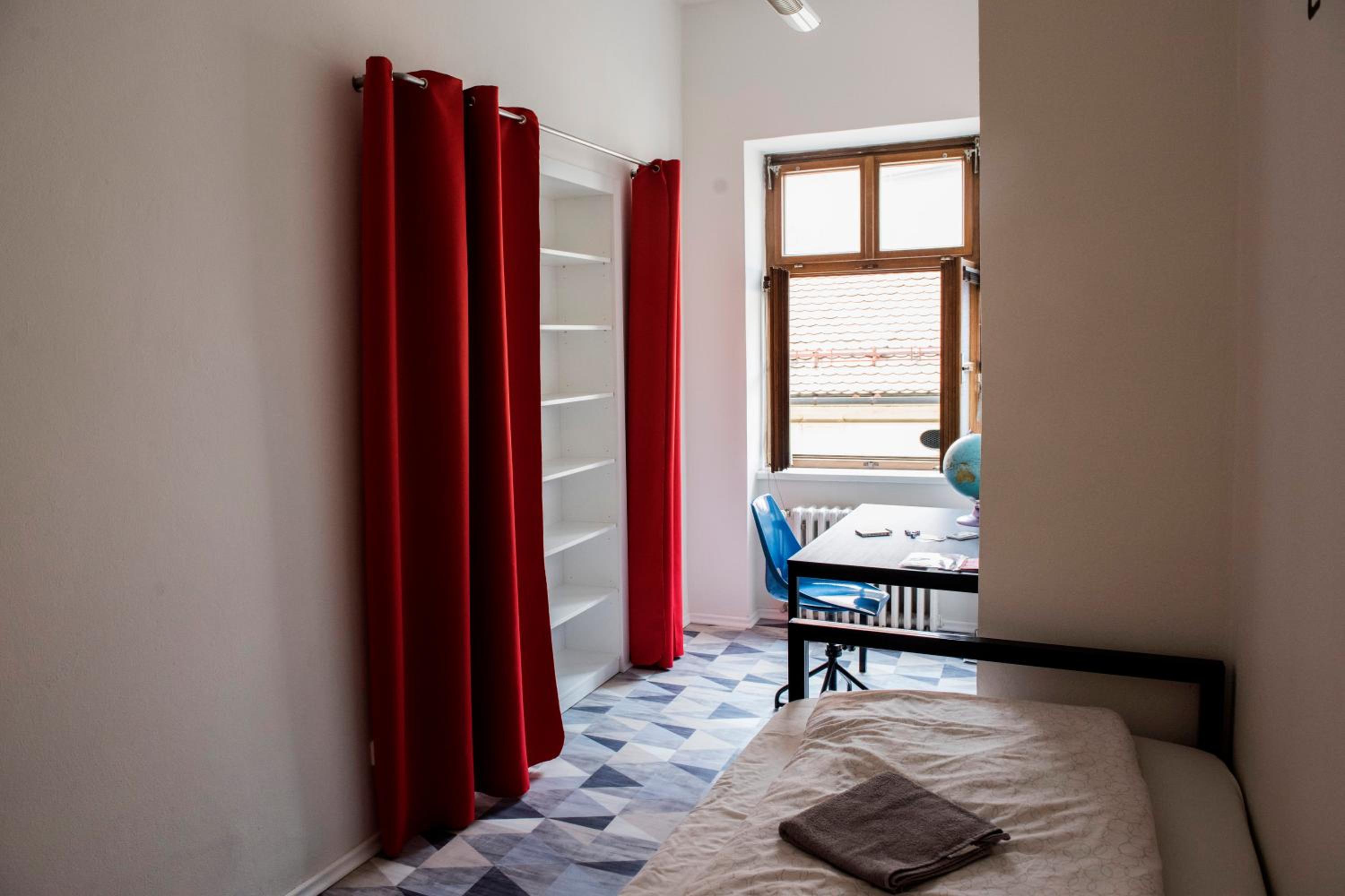 Basic Single Room with Shared Bathroom