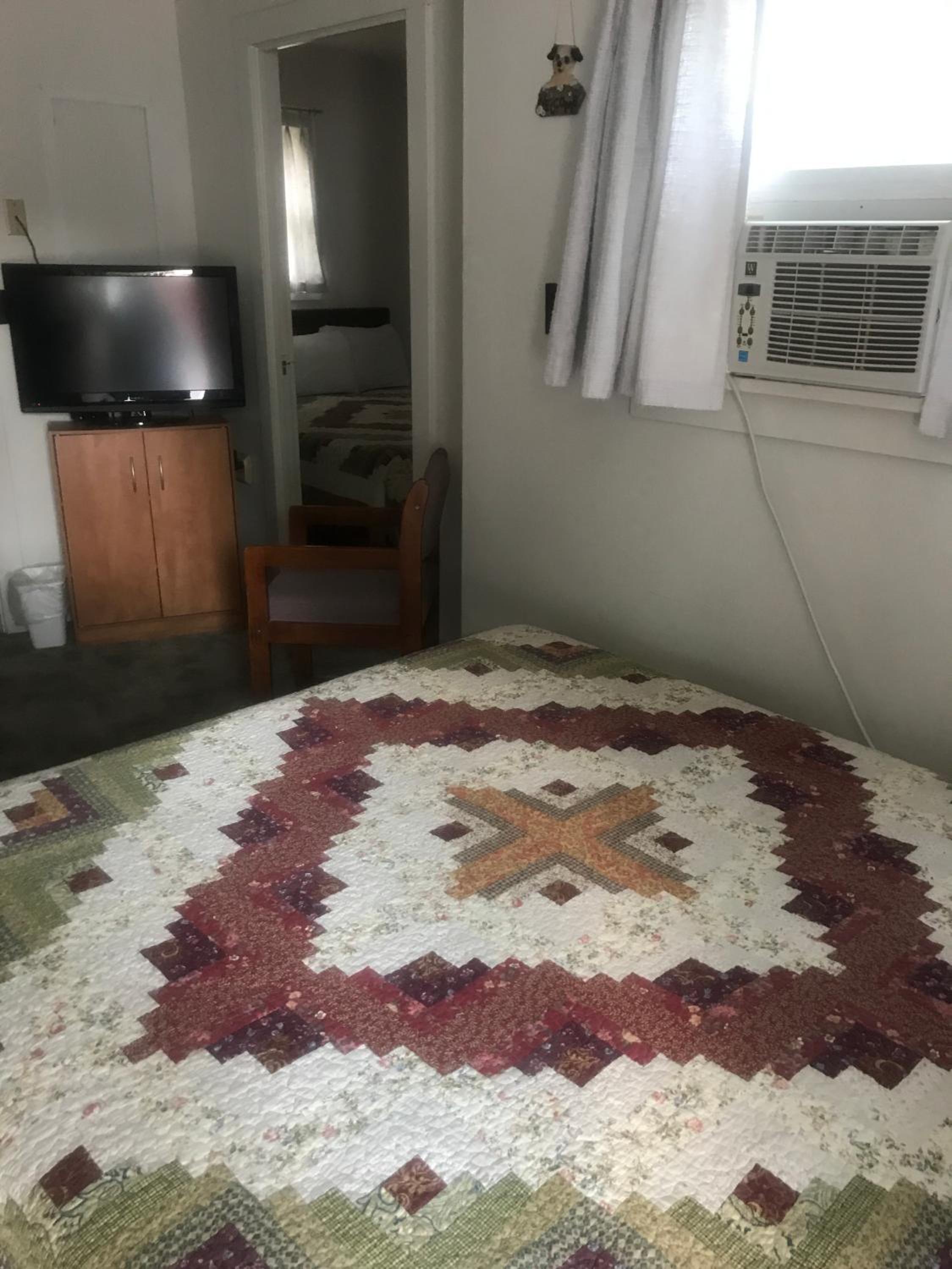 Standard Queen Room with Two Queen Beds - Photo 1
