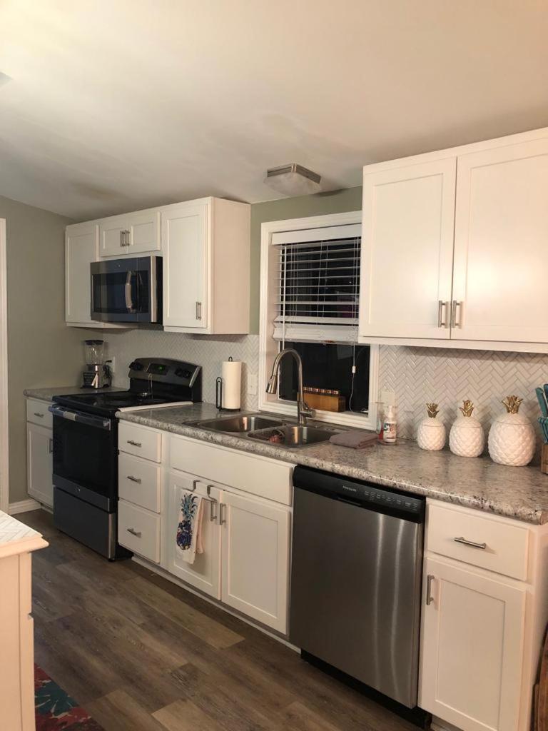 Three-Bedroom House - Photo 37