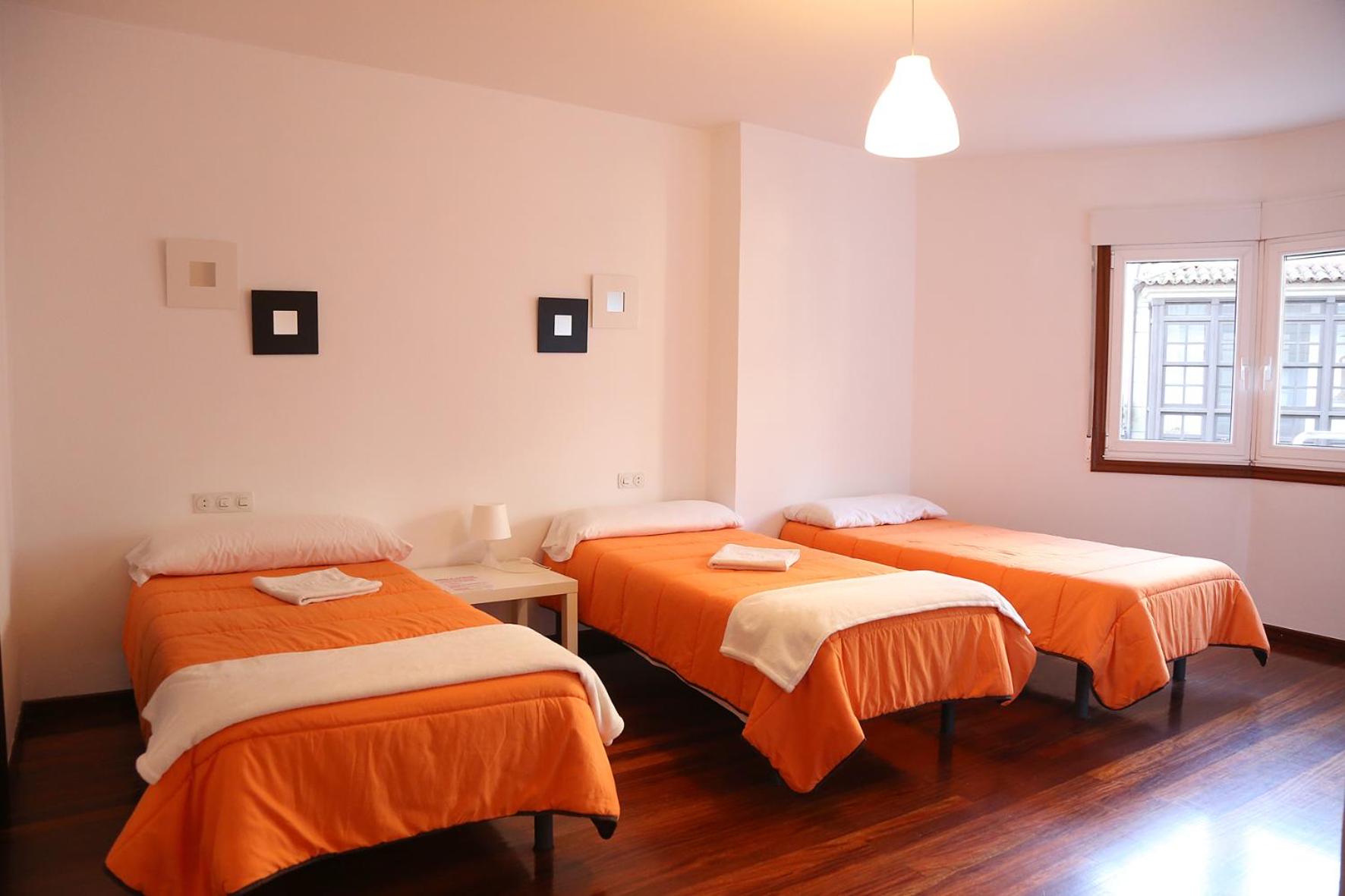 Habitación Triple Básica con Baño Compartido