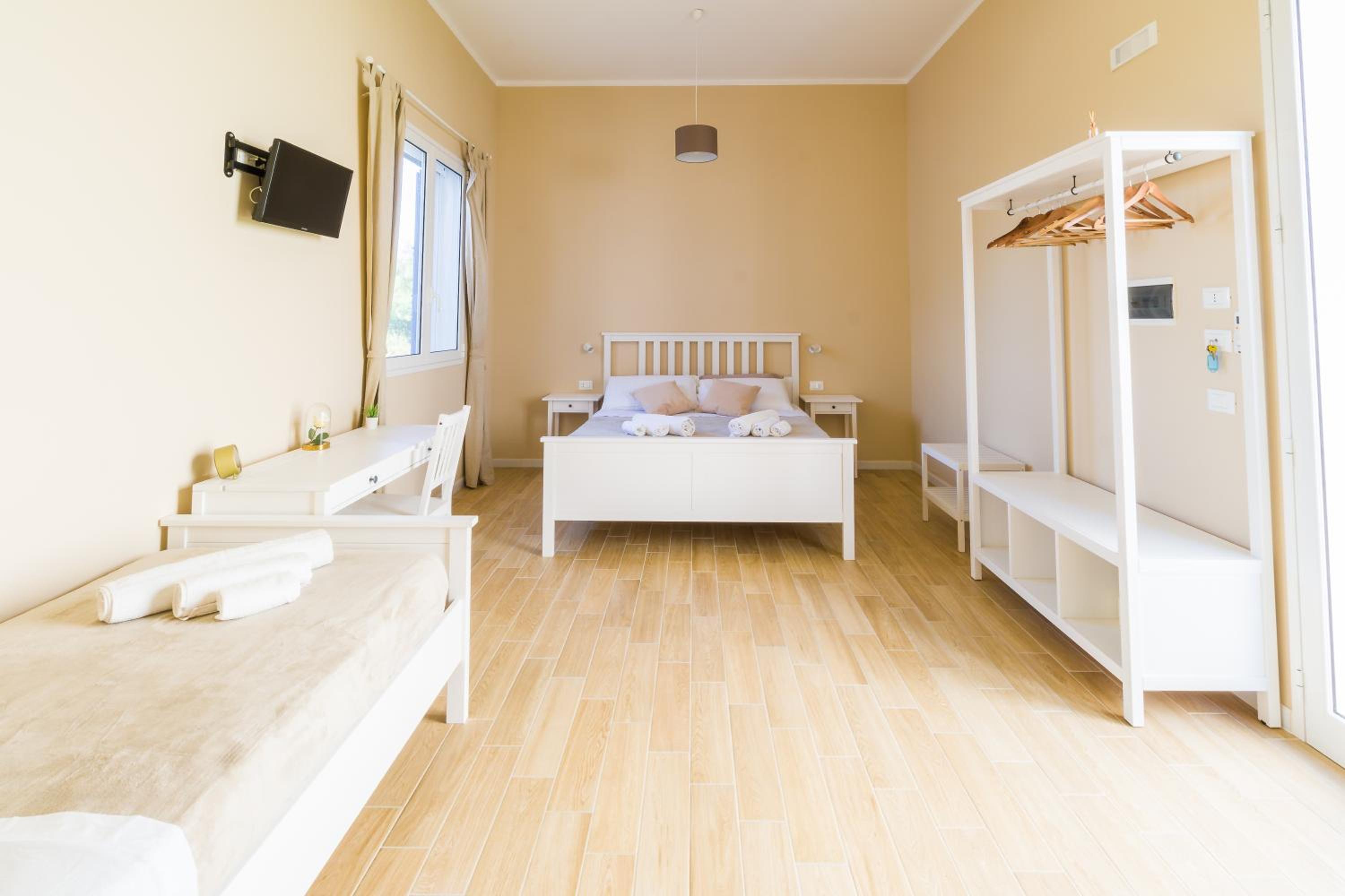Quadruple Room with Private Bathroom photo 1