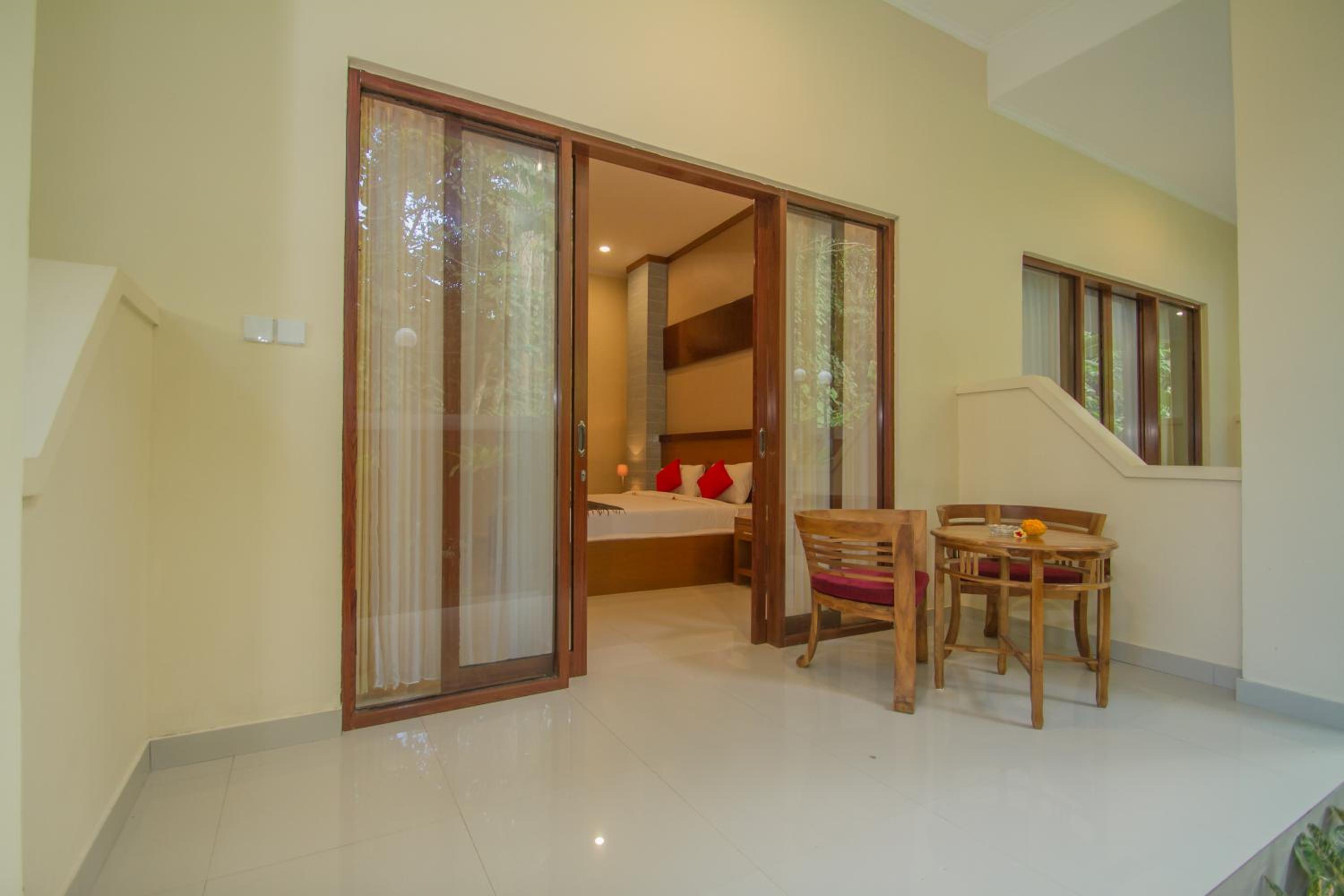 Deluxe Room with Garden View and Free Benefit - Photo 2