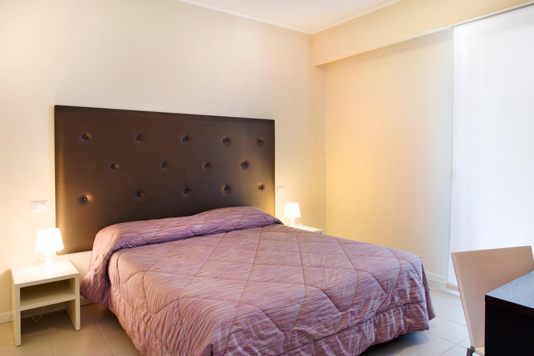 One-Bedroom Apartment with Terrace - Photo 11