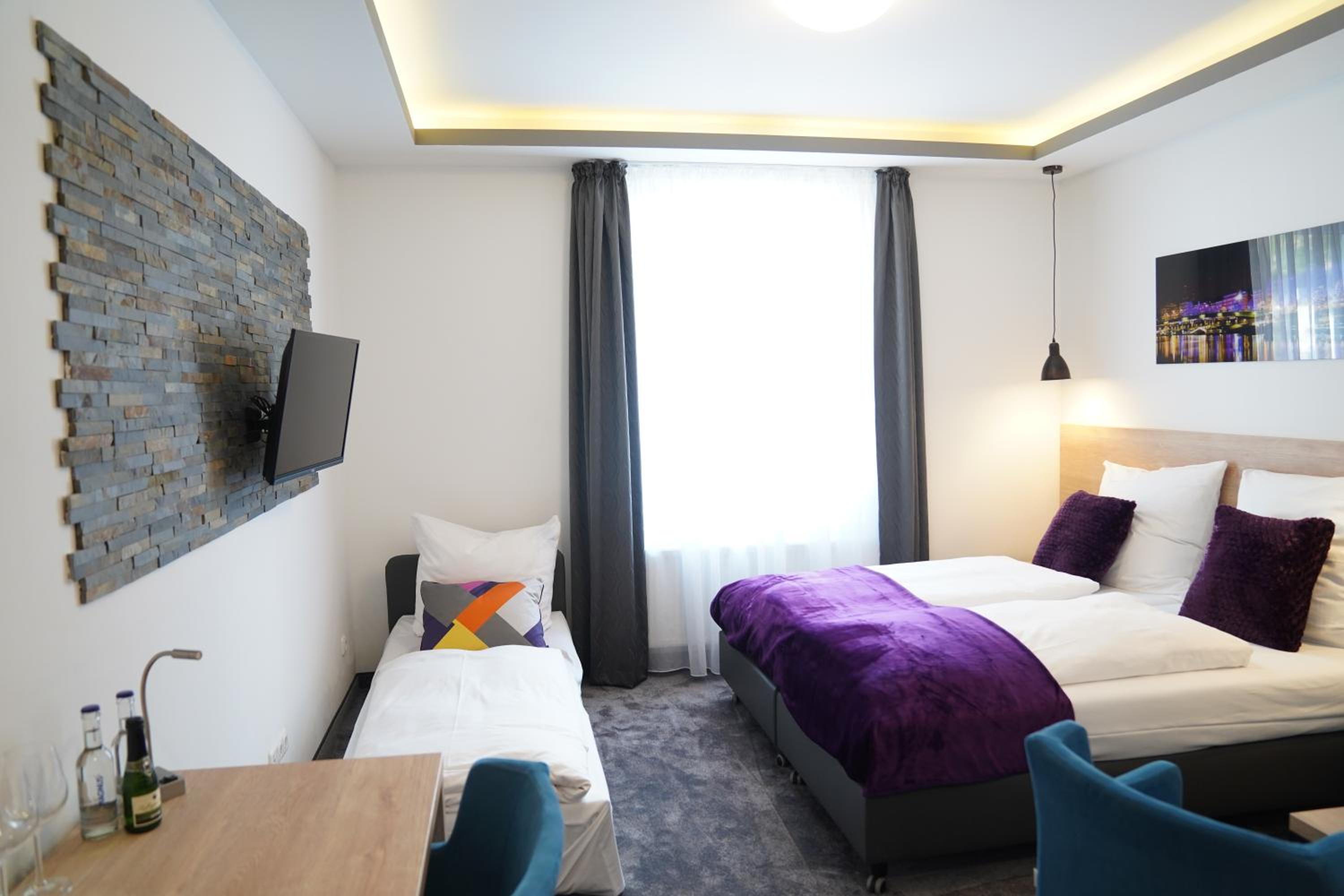 Deluxe Triple Room - Photo 2