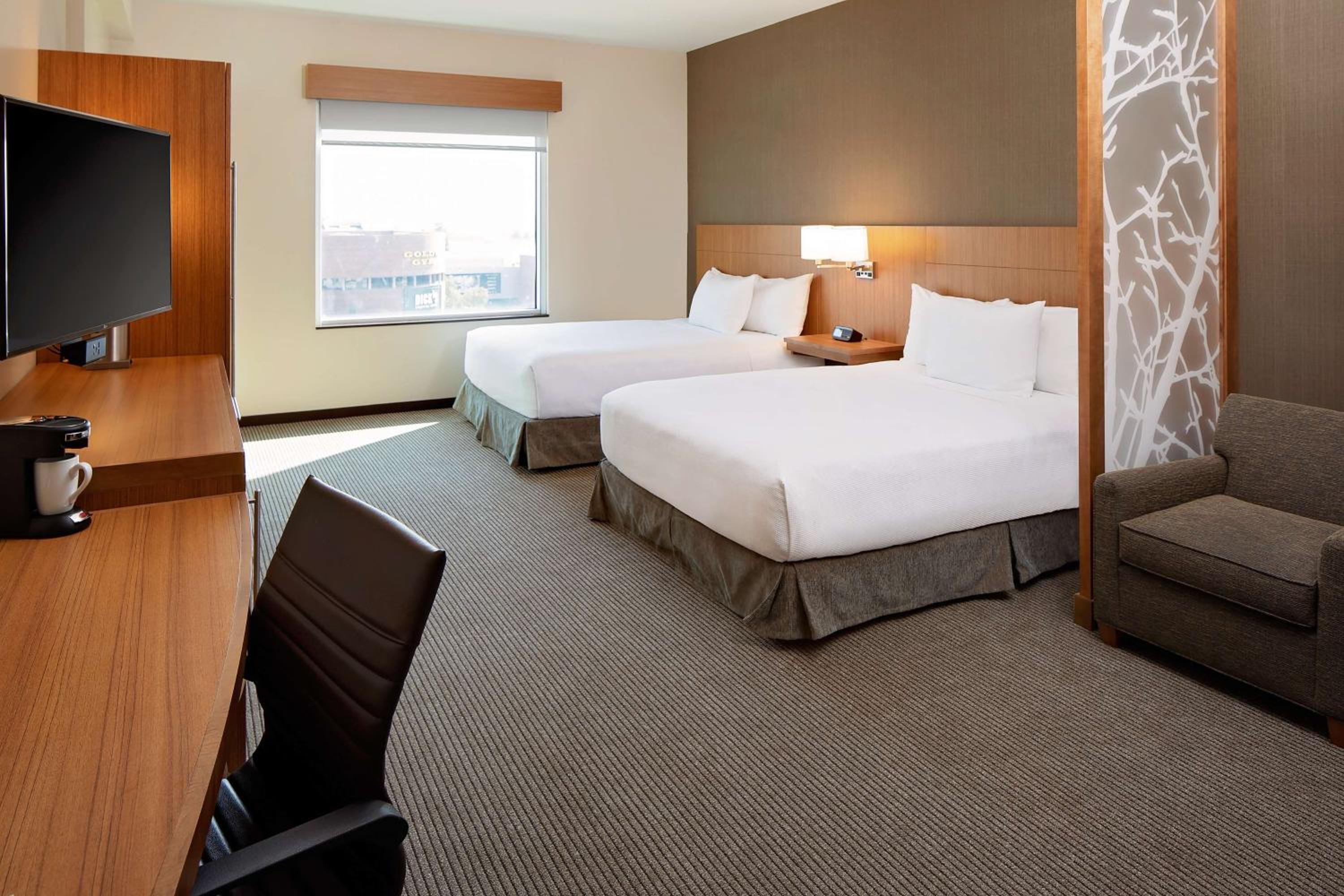 Queen Room with Two Queen Beds and Sofa Bed