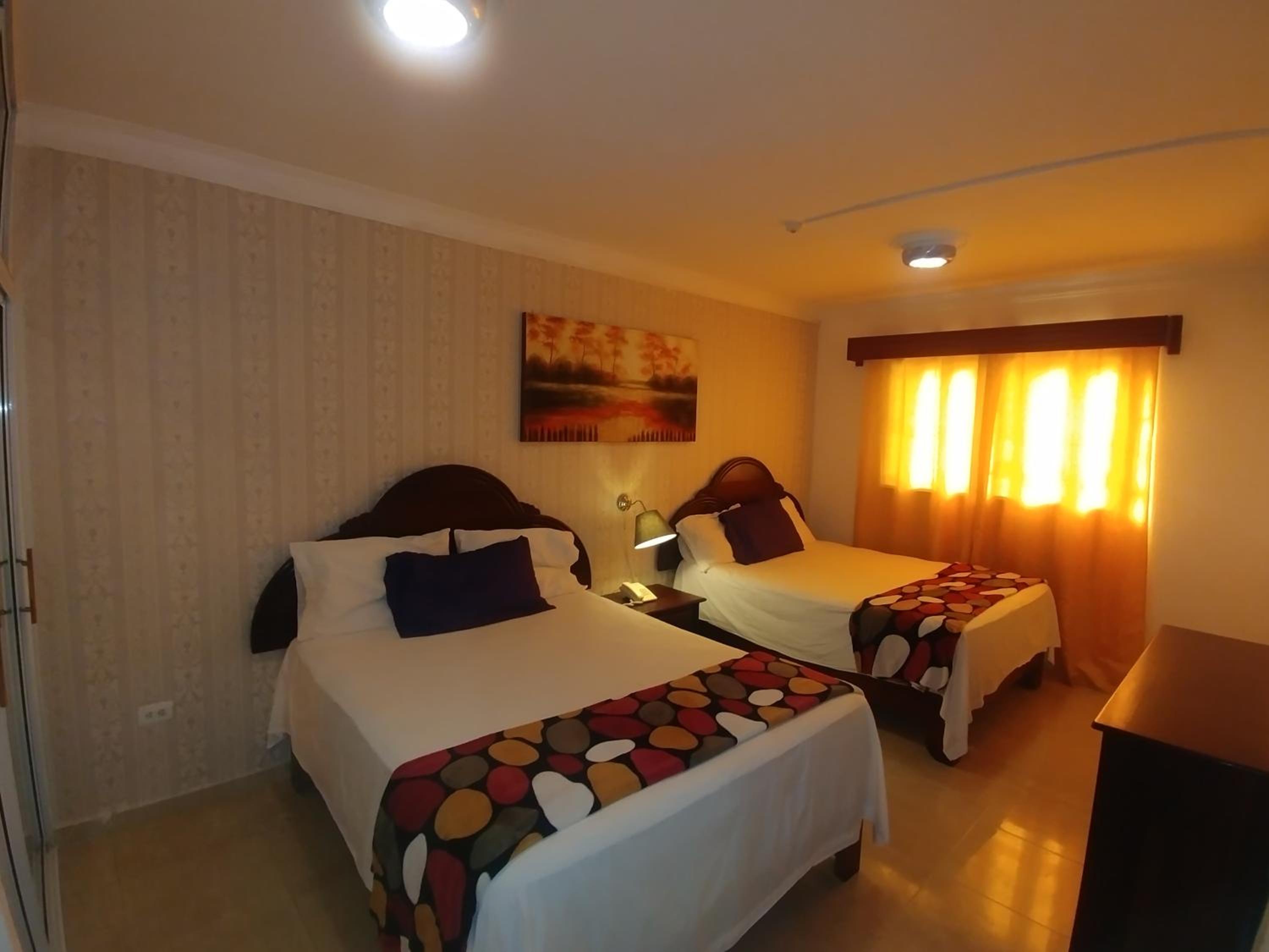 Standard Queen Room with Two Queen Beds photo 1