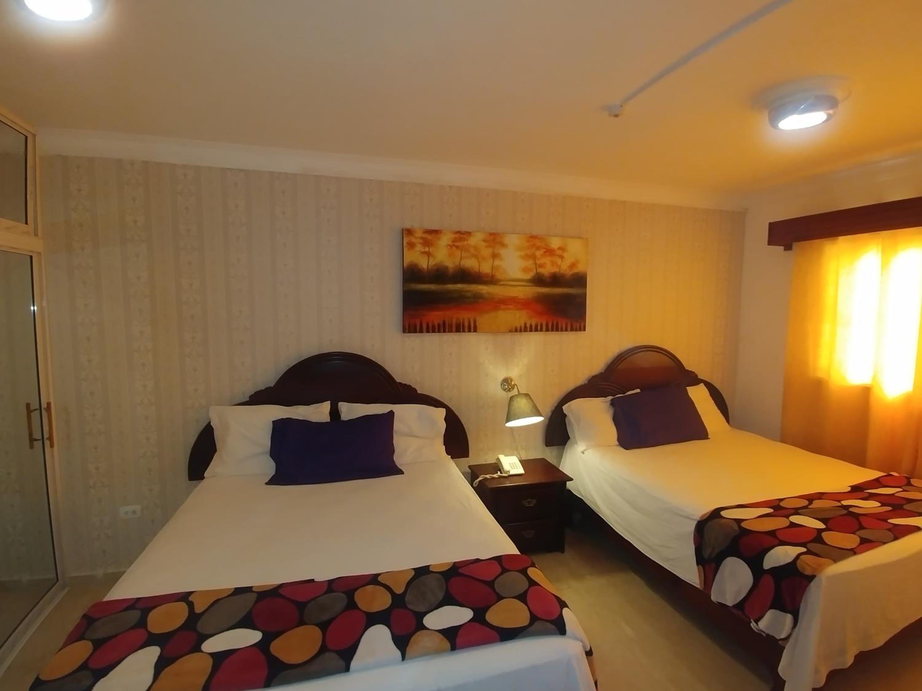 Standard Queen Room with Two Queen Beds photo 2