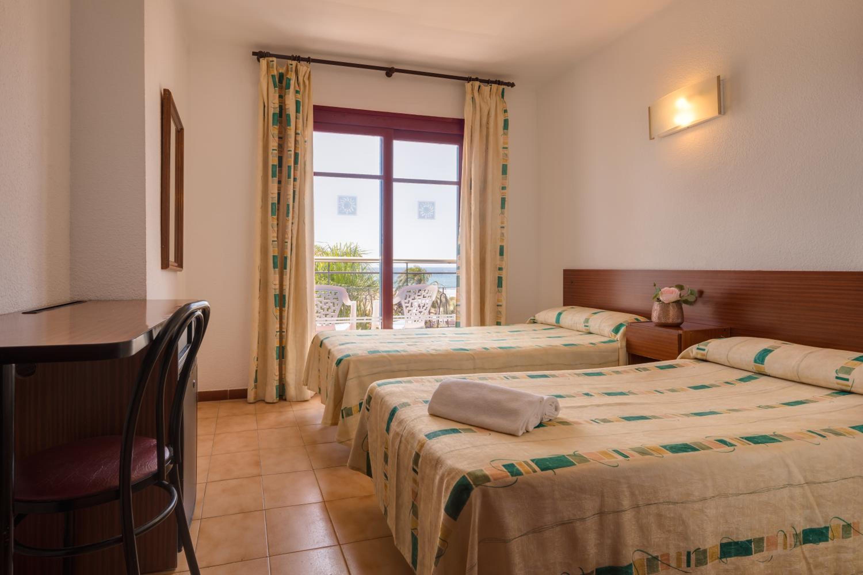Triple Room with Pool View (2 Adults + 1 Child)