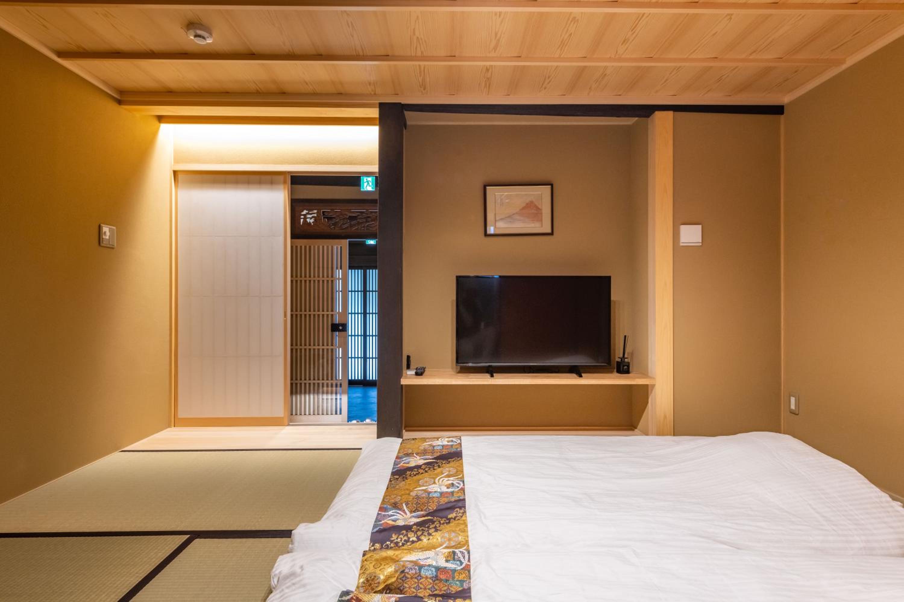 Three-Bedroom House - Photo 31