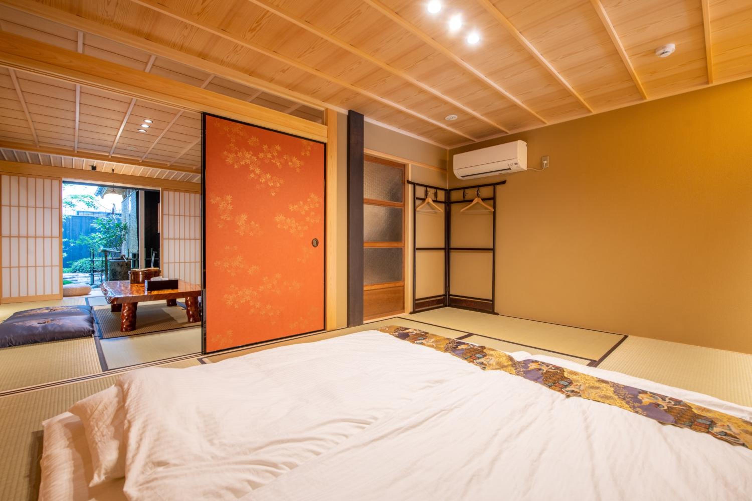 Three-Bedroom House - Photo 32