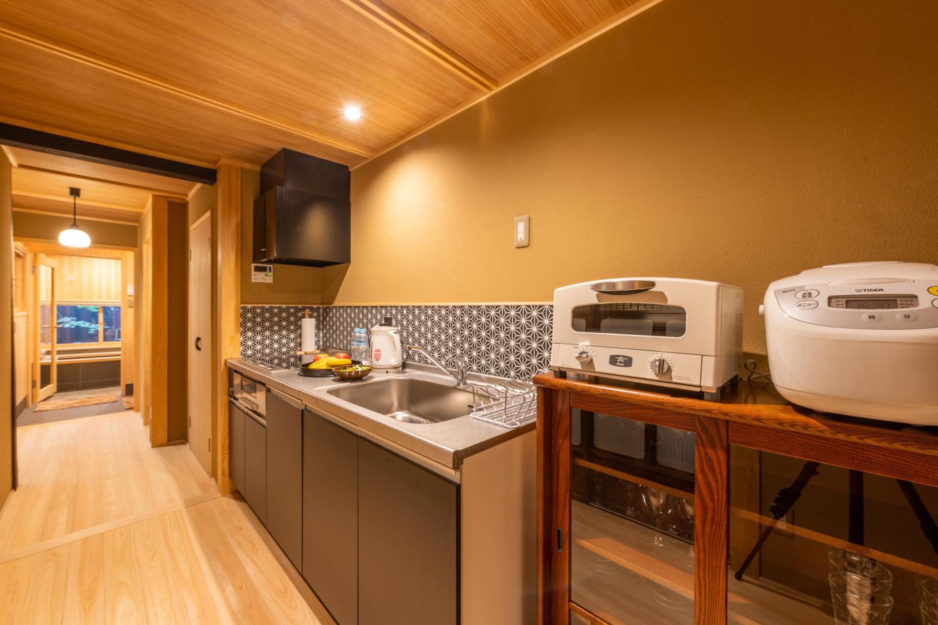 Three-Bedroom House - Photo 16