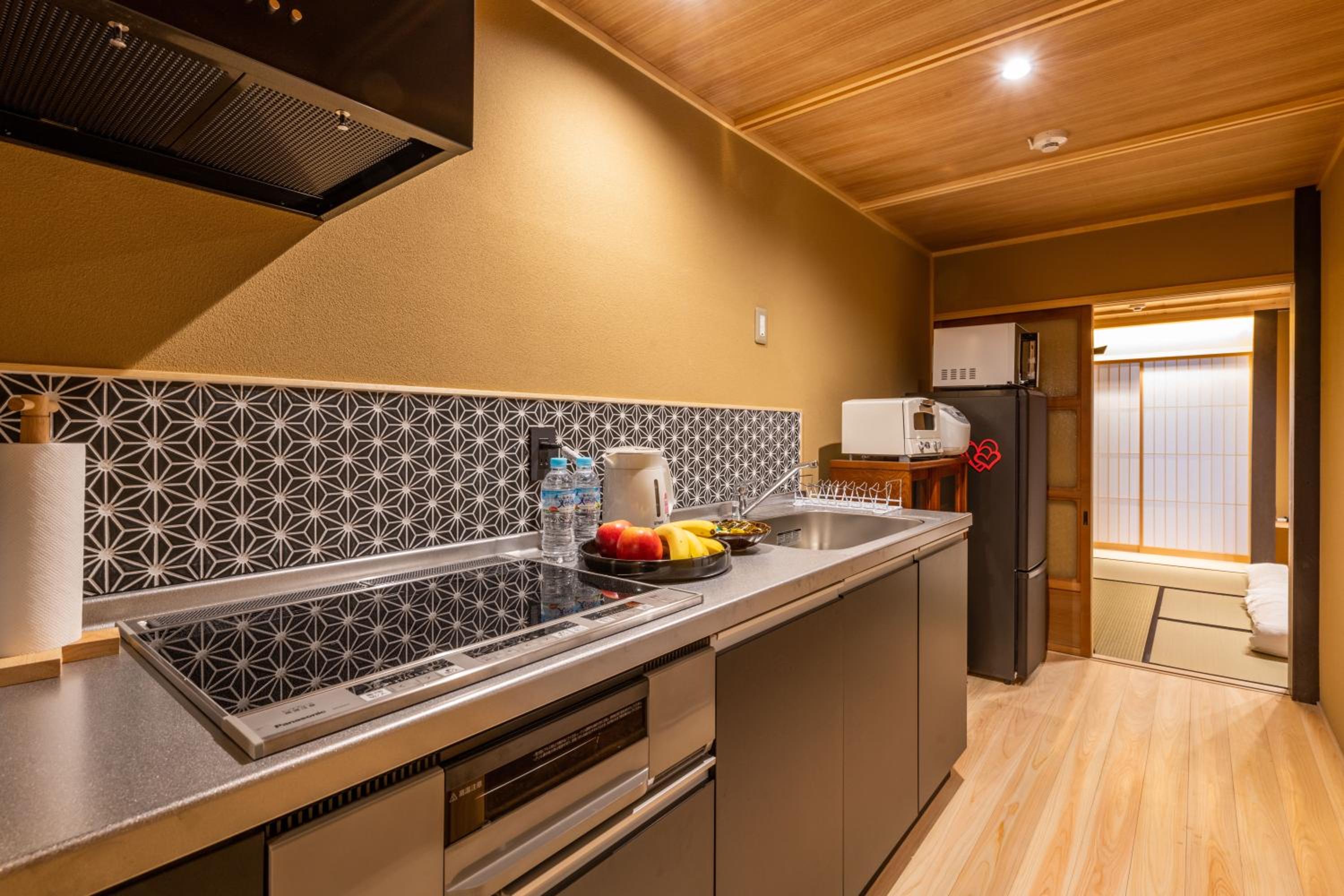 Three-Bedroom House - Photo 15